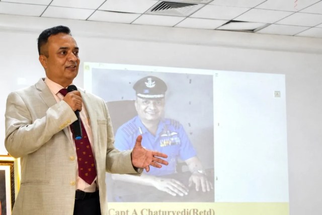 Group Captain Abhinav Chaturvedi (Retd.) delivering a professional readiness and career development session for students.