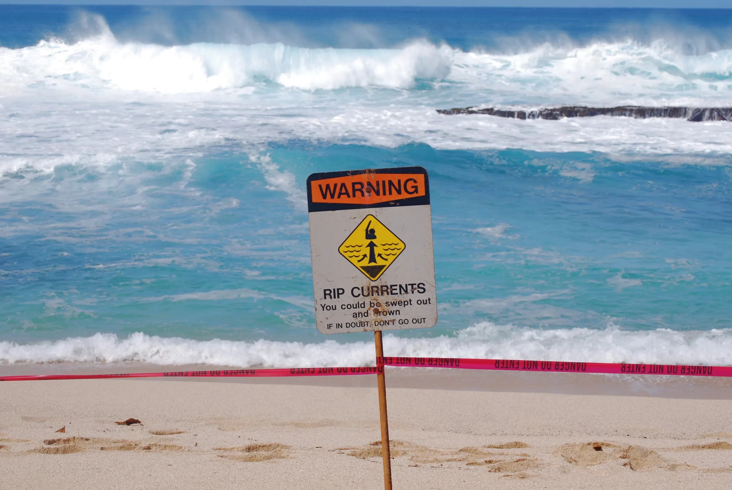 Riding the Waves of Busyness: Gain Perspective then Take Action. Photo of dangerous tide at beach.