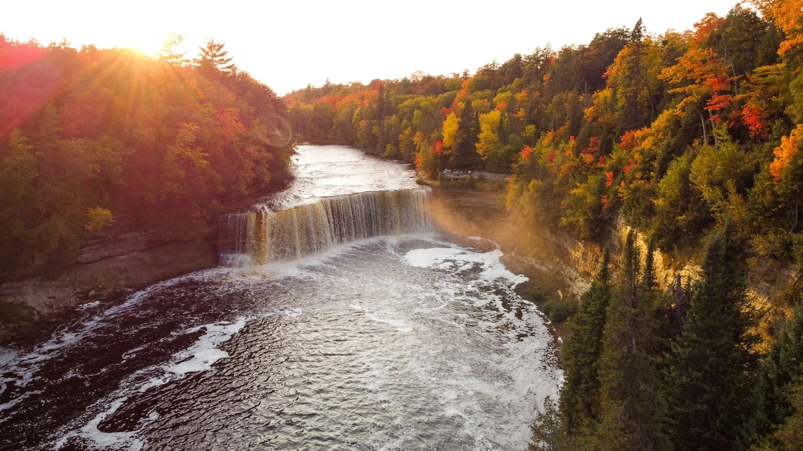 water falls in the middle of the forest - Image for blog titled "Letting Go and Going with the Flow" by Amariliz Gonzalez