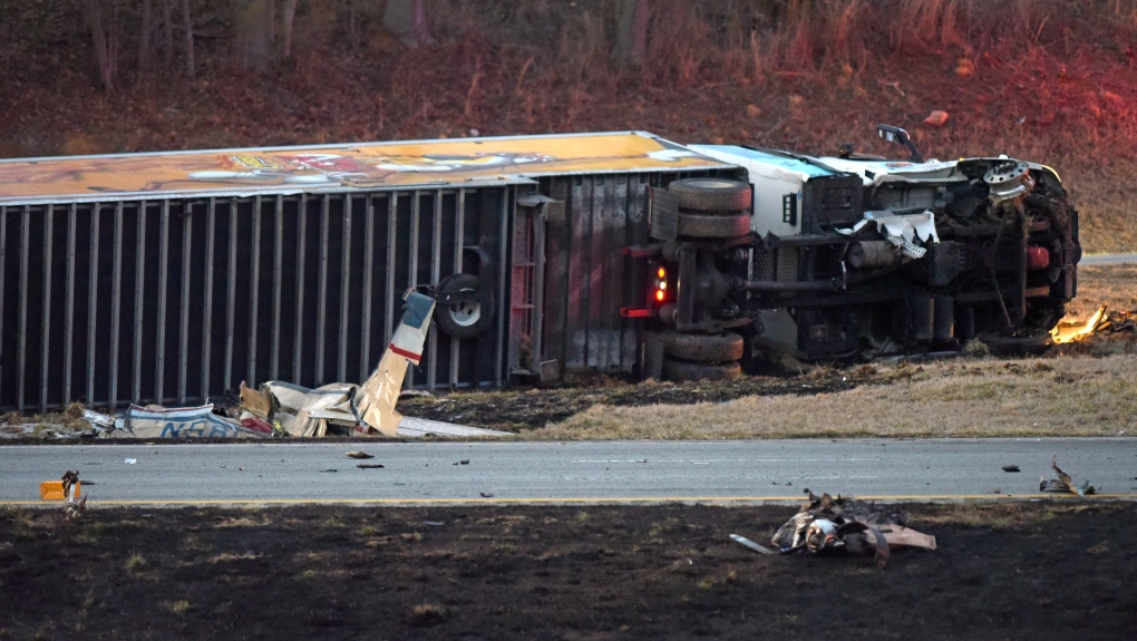 Plane crashes into tractor-trailer on North Carolina highway