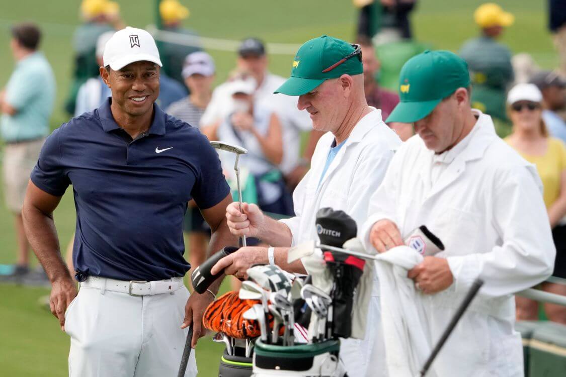 Golf Why Masters caddies wear the same white uniforms at Augusta, explained