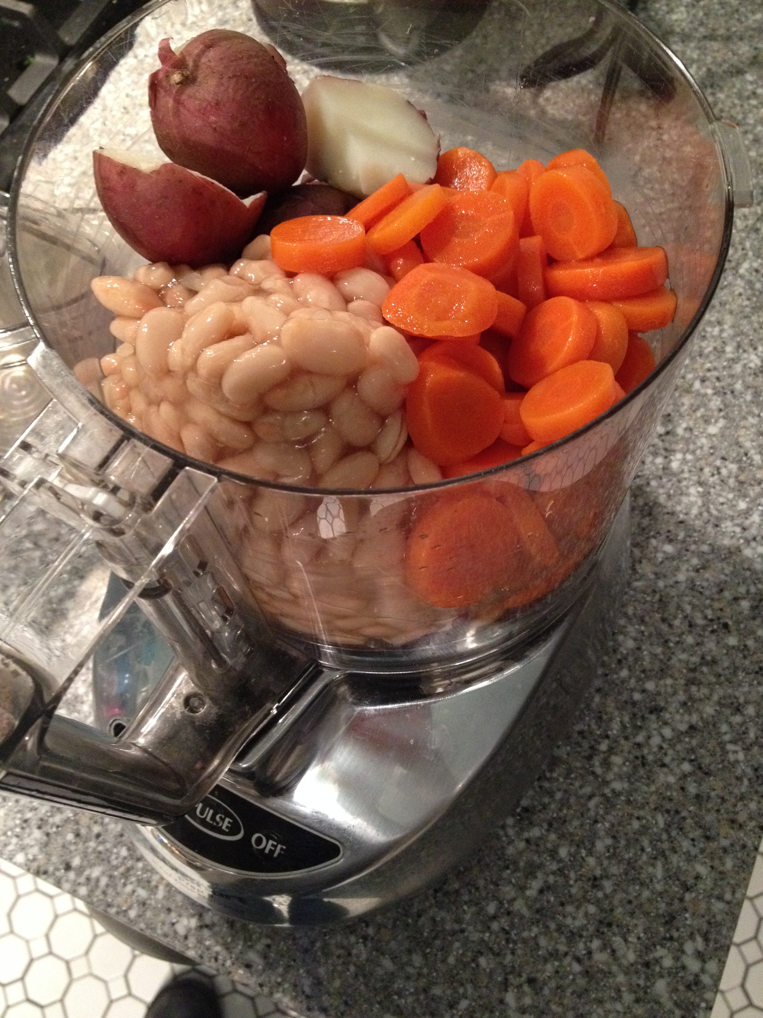 Add Cooked Potatoes, Beans and canned carrots to the food processor