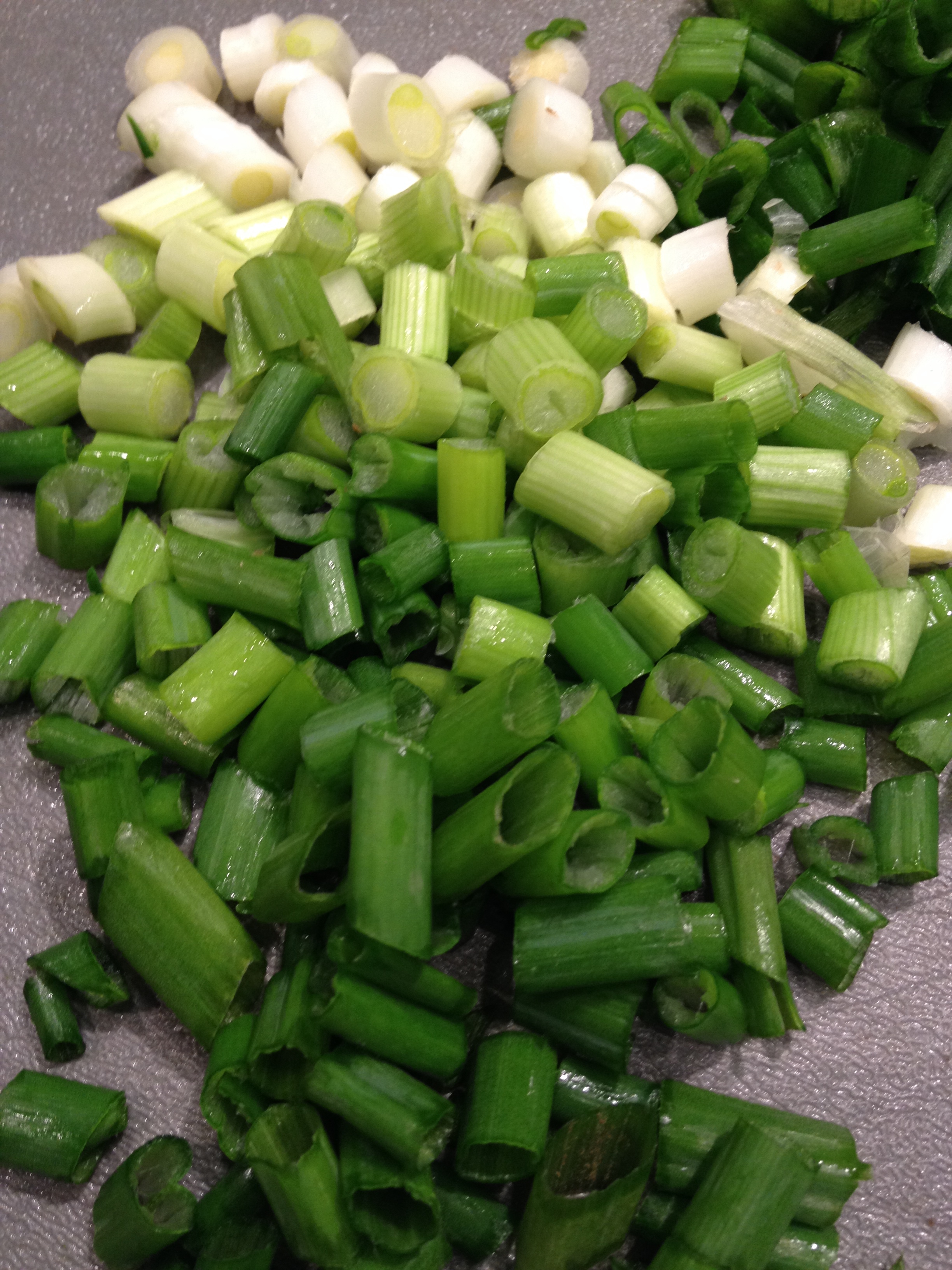 Dice your green onions.