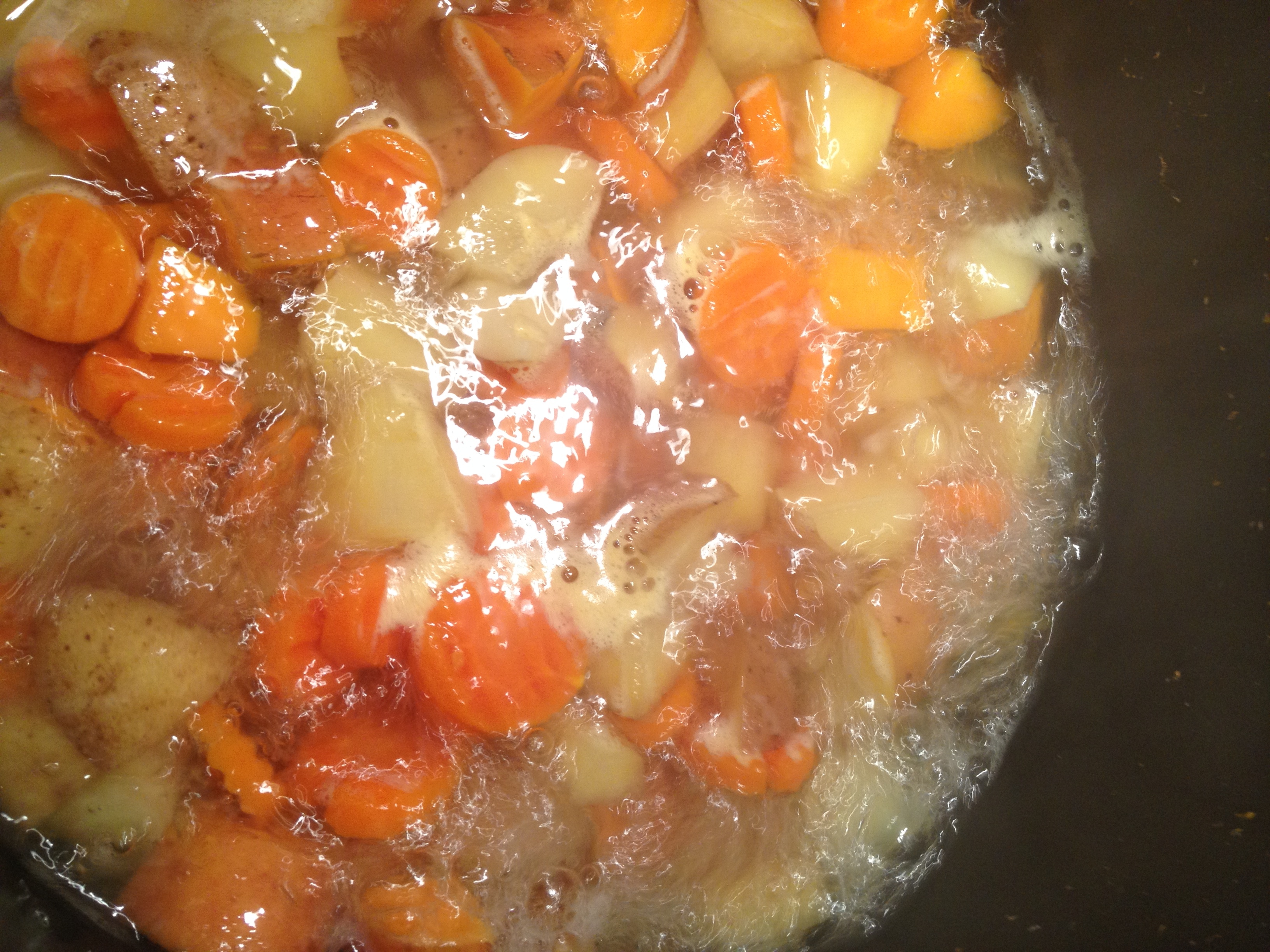 Bring potatoes to a boil and let simmer for 30 minutes or so. (The larger your potato cubes, the longer you will need to boil them. Until tender.