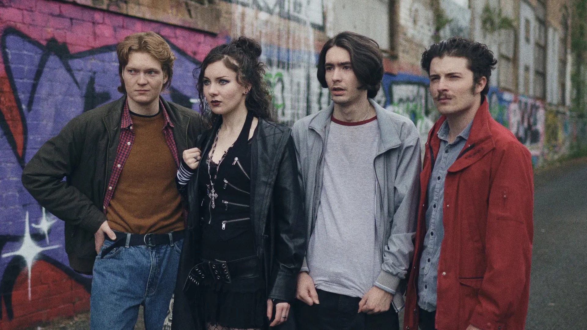 A group of investigators standing side-by-side in "Mr Whispers"
