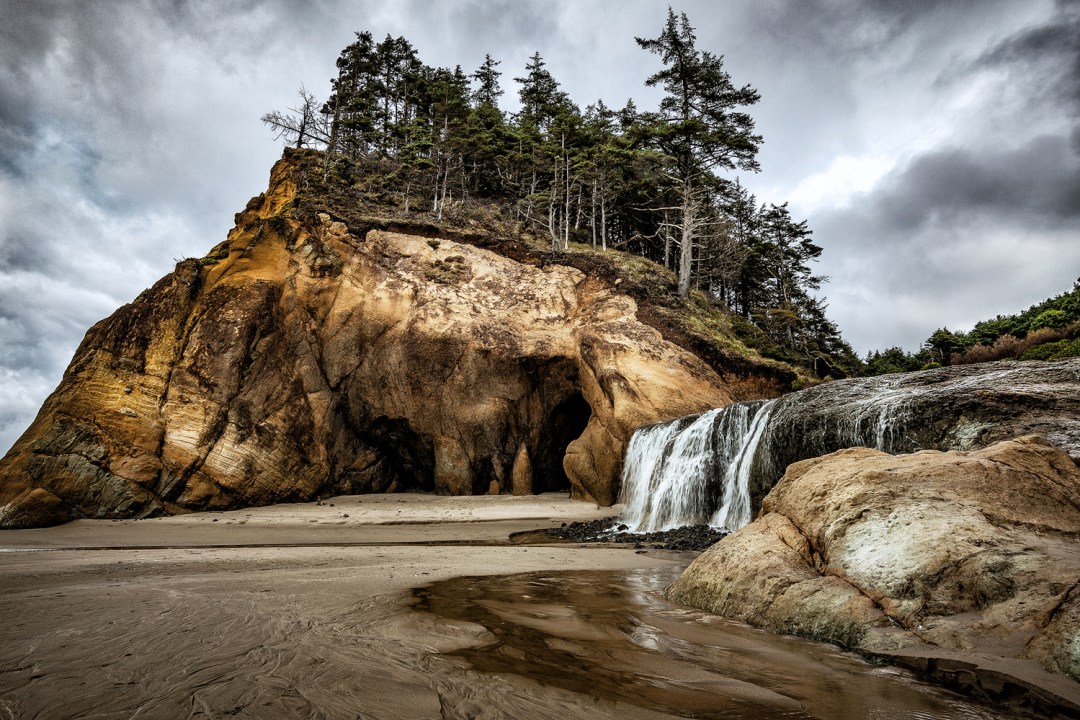 Hug Point A landscape photo of Hug Point just outside of Cannon Beach, Oregon on the Oregon Coastline.