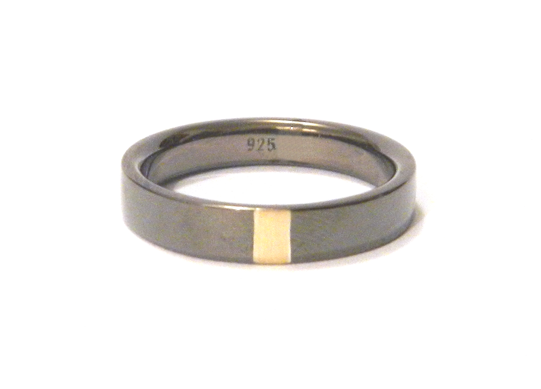 Dan's engagement ring, 2012, 18kt yellow gold, black rhodium plated 925 silver