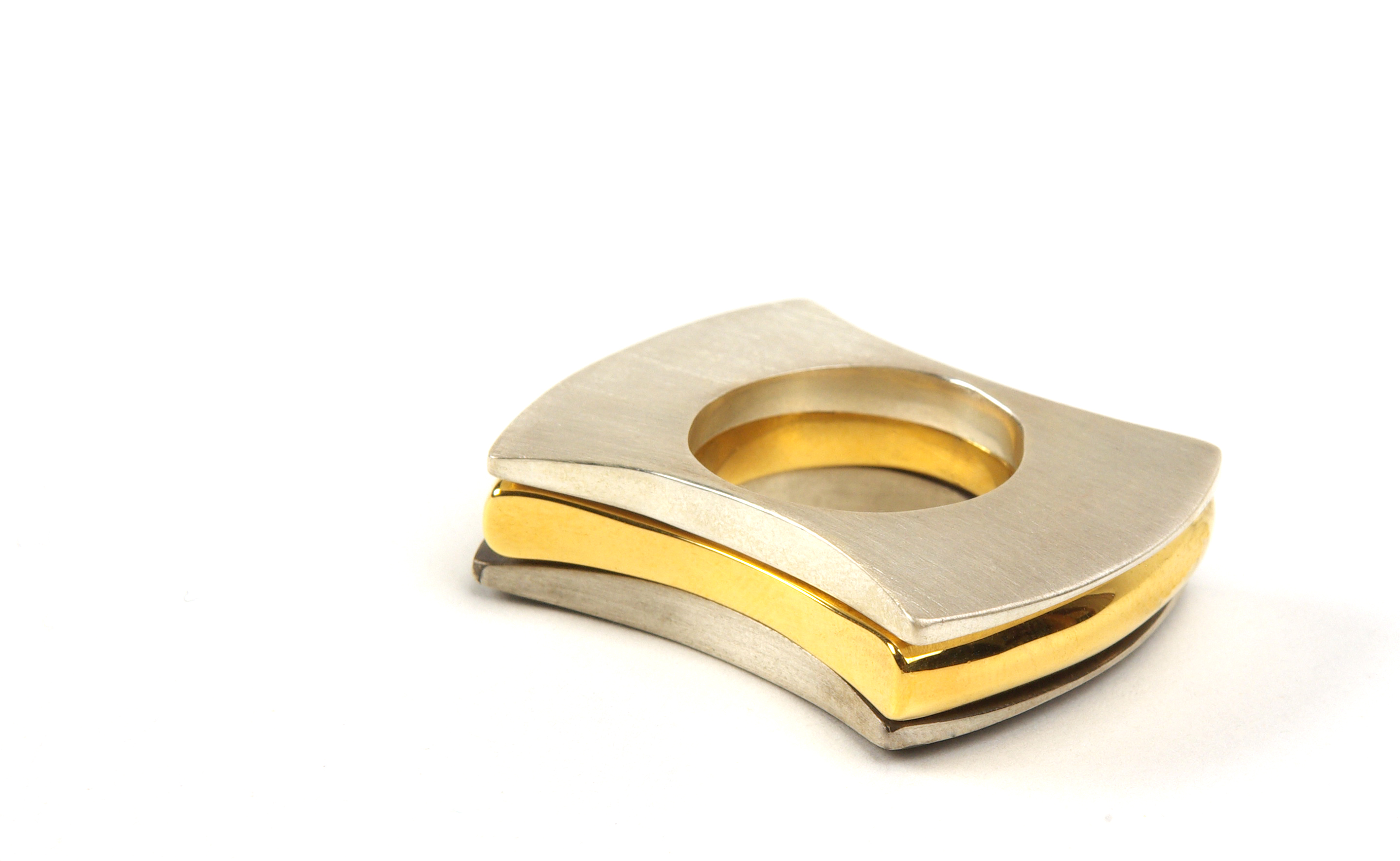Same Same But Different, 1 ring set stacked, 2009, gold-plated copper, oxidised 925 silver, 925 silver