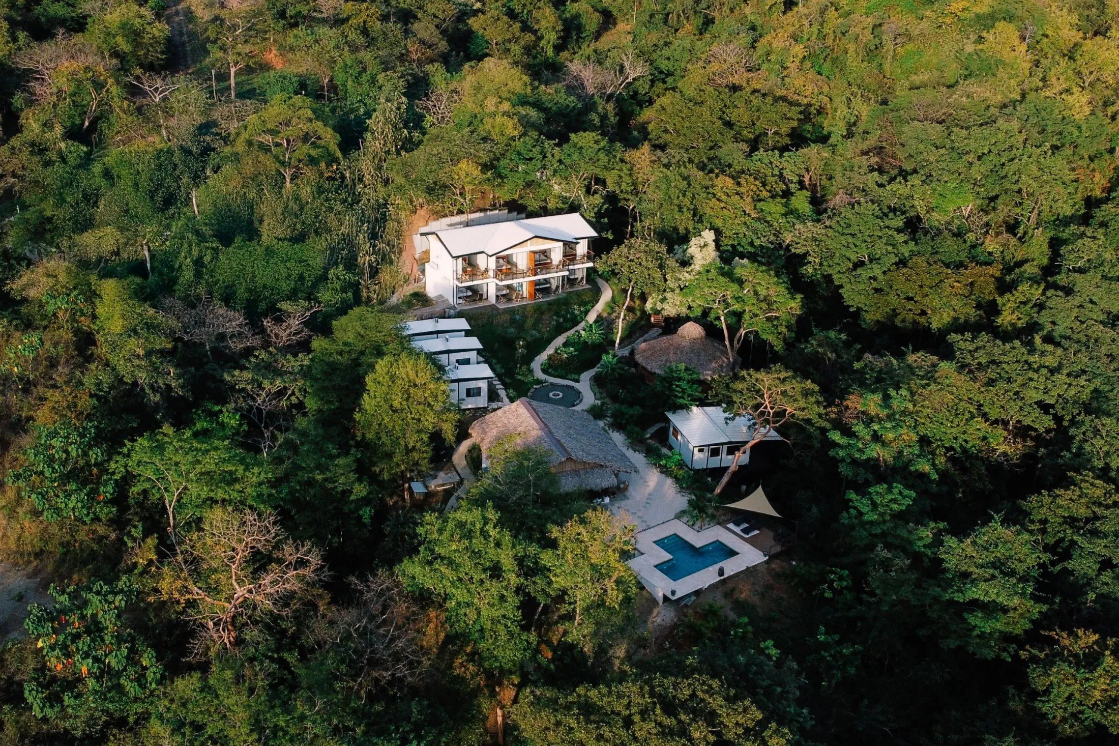 A drone shot of Ananda Lodge nestled in the Costa Rican Jungle.
