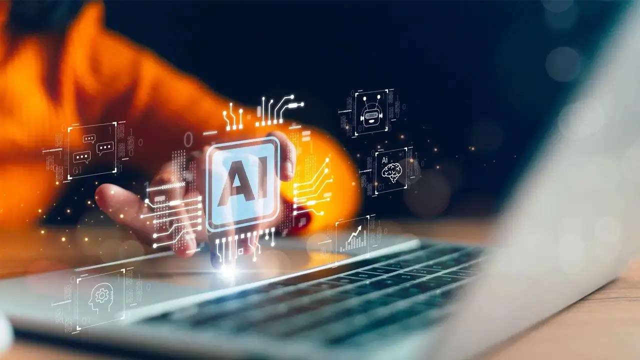 Close-up of a hand interacting with AI-powered interface above a laptop keyboard, symbolizing artificial intelligence in web development.