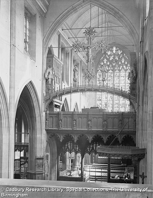 St Agnes Kennington, chancel screen (1885-9) by T. L. Moore, looking north-east c.1921. [Source: University of Birmingham Special collections Freeman/453]