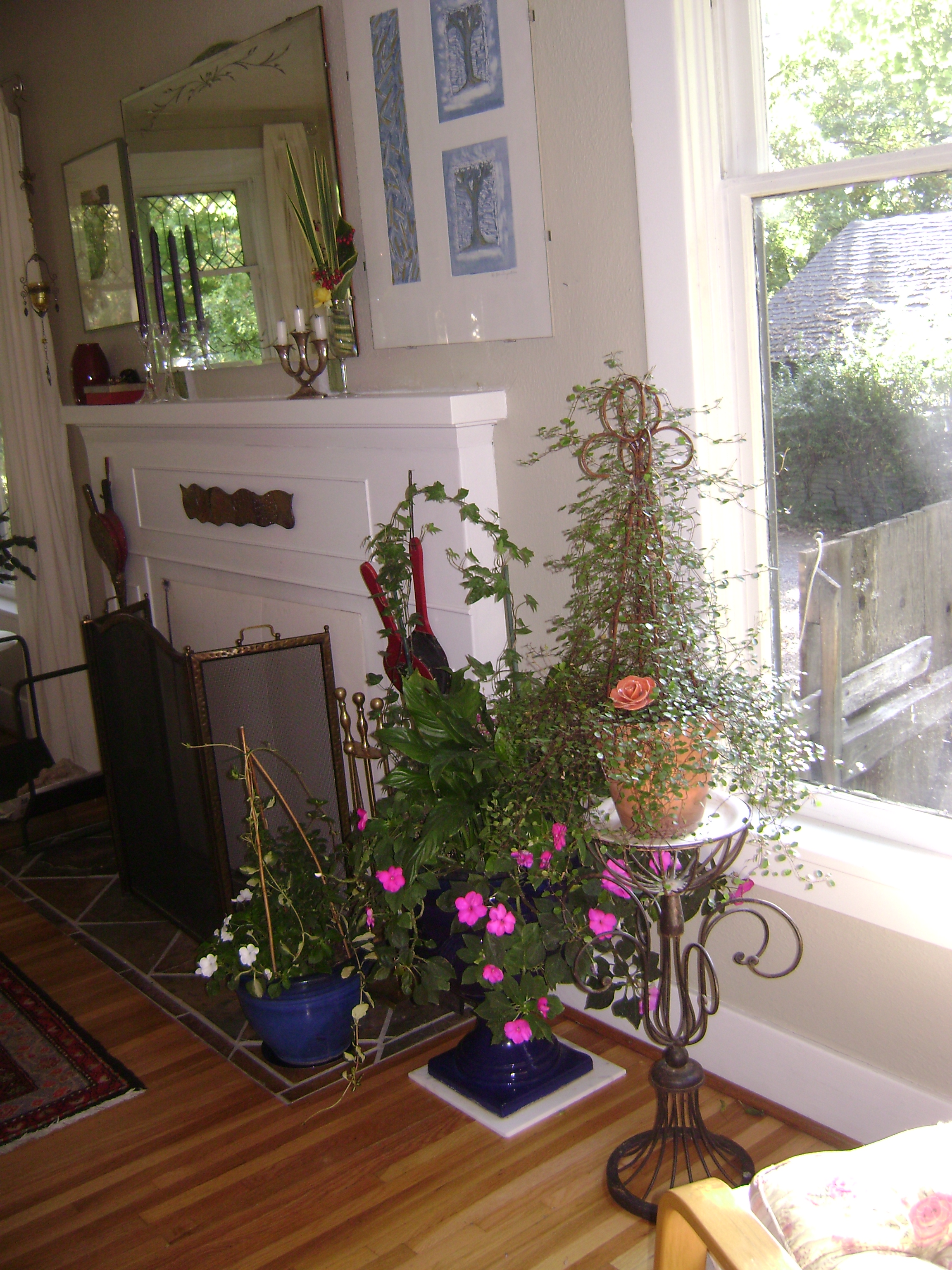 Flowers by fireplace