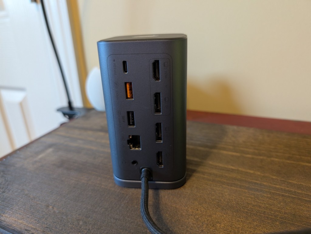 Rear view of the Baseus Spacemate docking station, showcasing multiple USB ports, HDMI connections, an Ethernet port, and a power input.