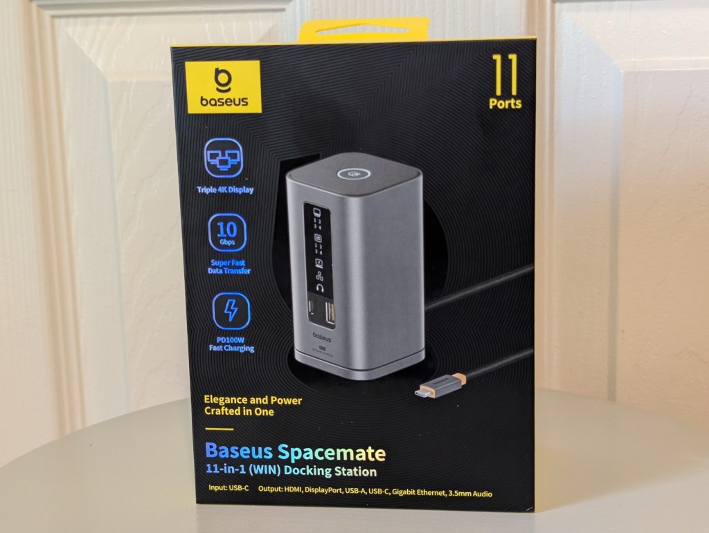 Baseus Spacemate 11-in-1 docking station for Windows displayed in packaging, showcasing features like triple 4K display, USB-C input, and multiple ports.