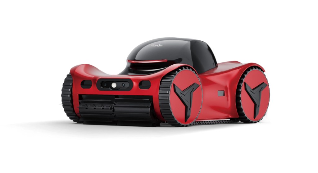 A red robotic pool cleaner with a sleek design, featuring a black top, dual cameras, and large wheels, positioned for automated pool maintenance.
