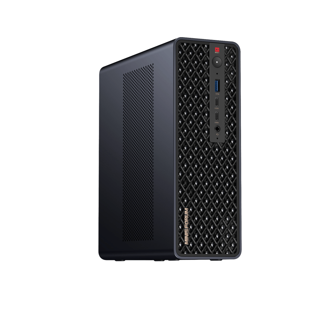 A compact desktop computer with a sleek black design featuring a patterned front panel and various ports on the side.