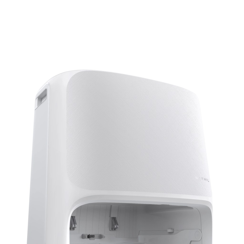 A modern white water dispenser with a textured surface and two spouts at the bottom.