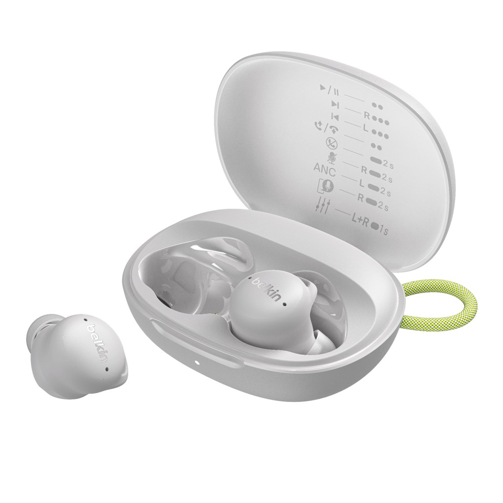A pair of Belkin wireless earbuds inside a charging case, with one earbud placed outside the case. The case features a green loop for easy carrying.