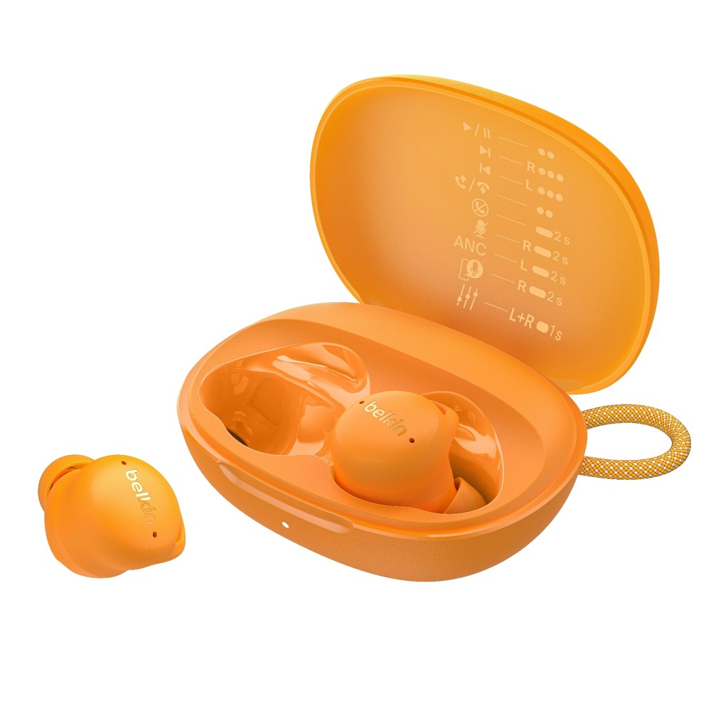 Close-up of orange wireless earbuds in a matching charging case, featuring controls and indicators on the lid.