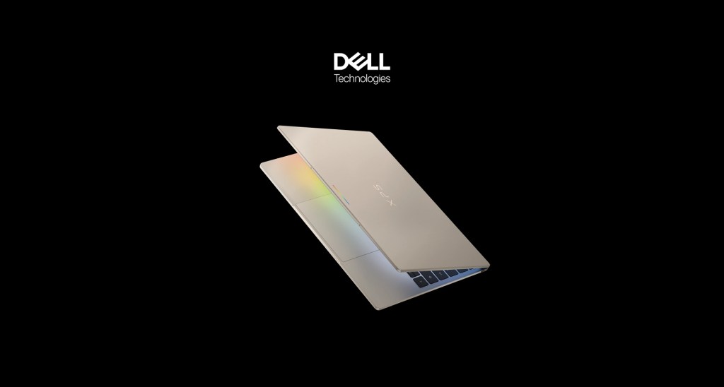 A Dell laptop partially open, showcasing its sleek design and keyboard against a black background.