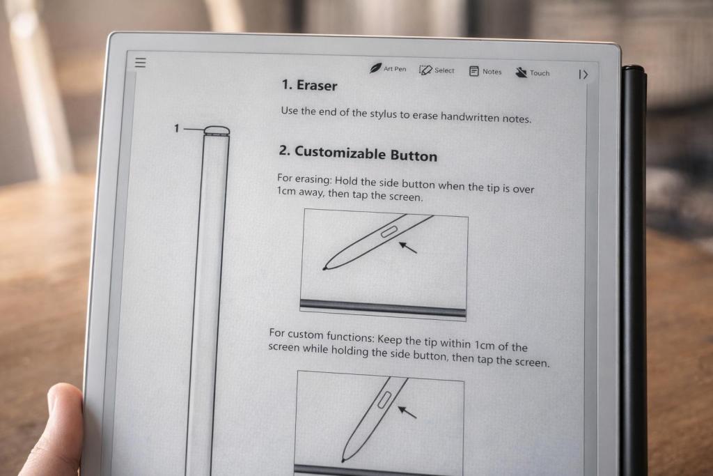 A close-up of a digital screen displaying instructions for using a stylus, highlighting an eraser function and customizable button features.