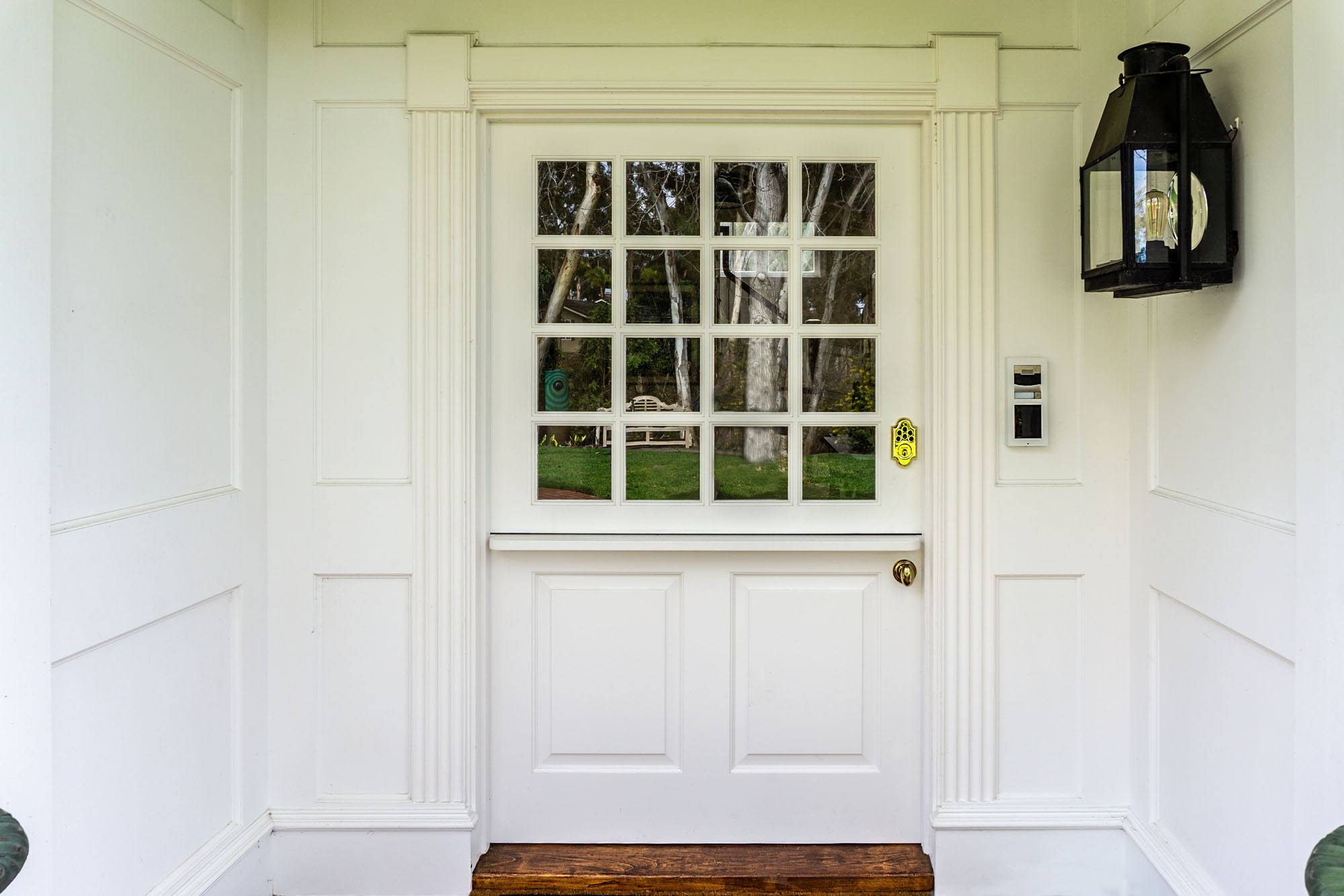 Video intercom installed beside an entry door at an Andrus smart home project in Rancho Santa Fe.