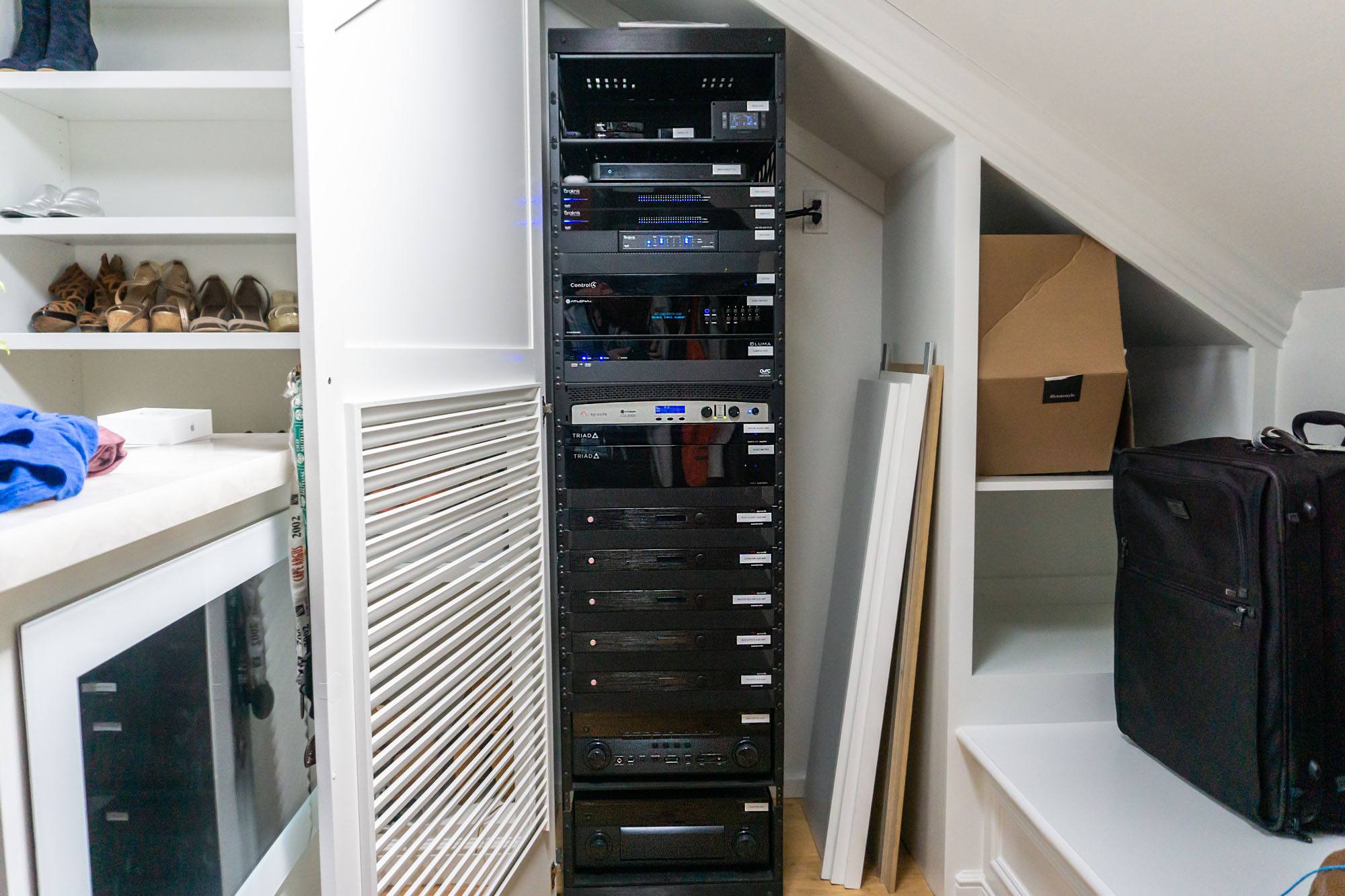 Centralized equipment rack in an Andrus smart home installation in Rancho Santa Fe.