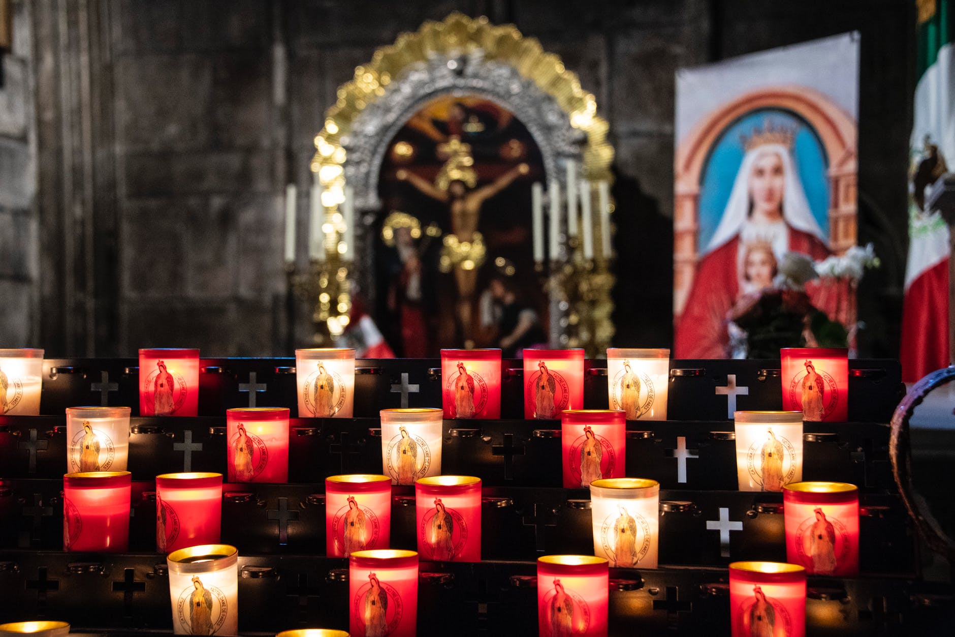 white and red candles on black steel frame