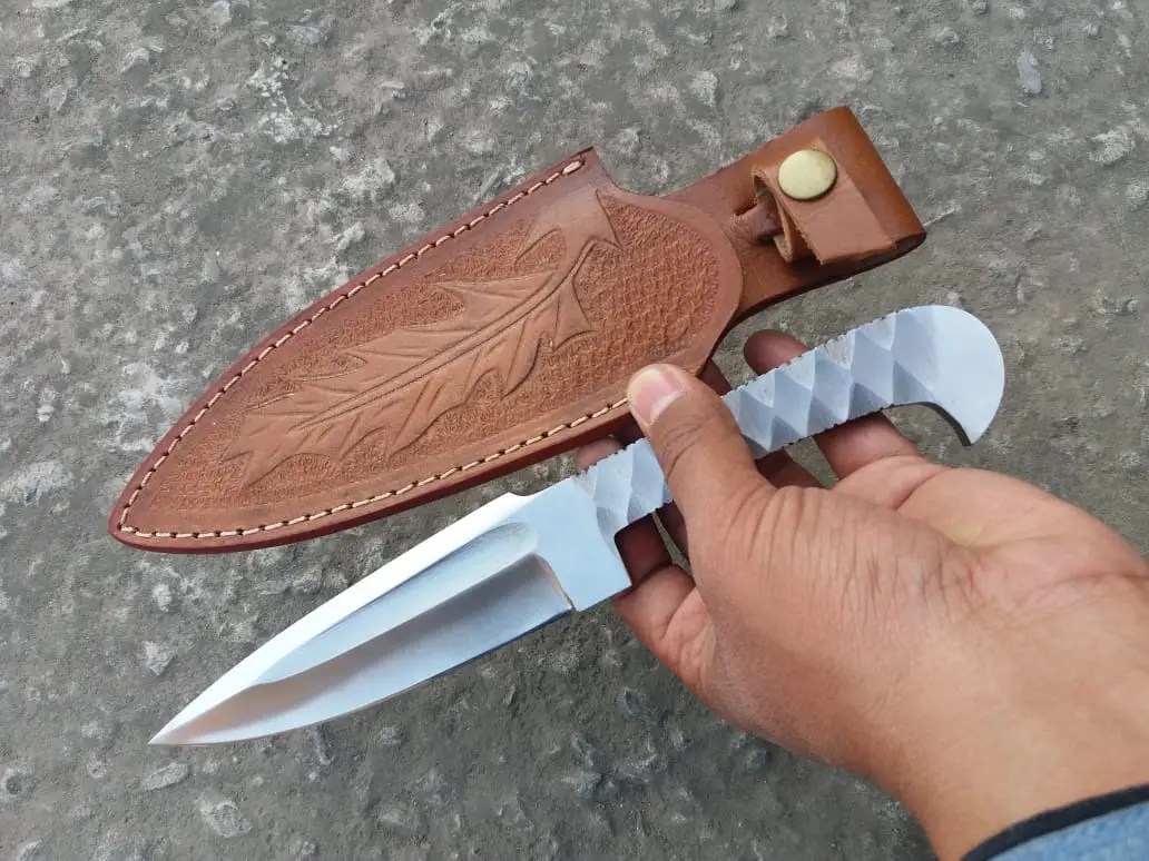 Custom made 5160 steel integral hunting knife with brown leather sheath.