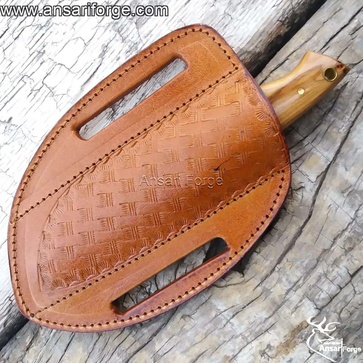 Damascus steel EDC knife securely housed in a hand-stitched genuine cowhide leather cross draw sheath.