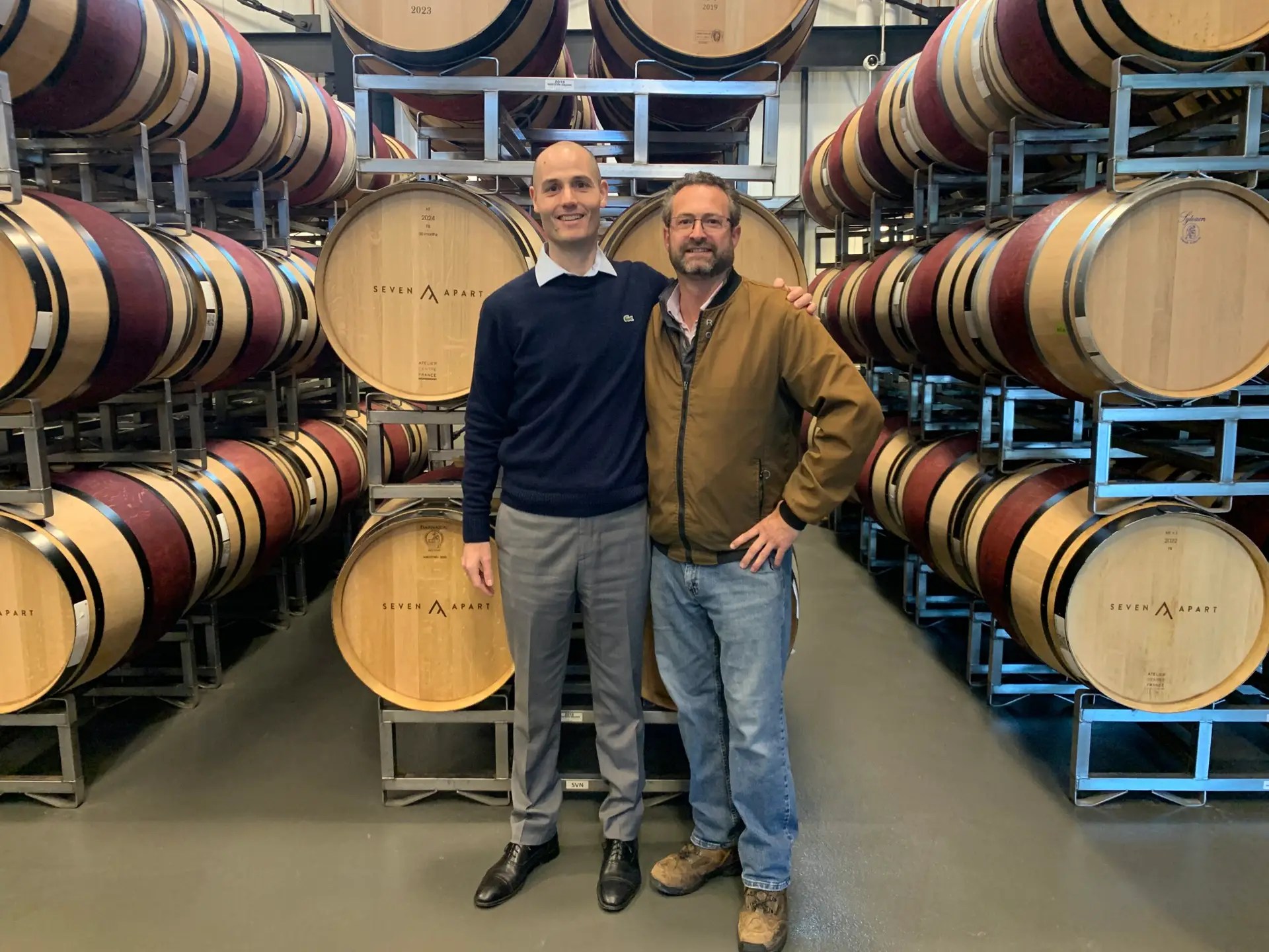 Managing Partner Yannick Girardo (left) poses with Head Winemaker Morgan Maureze (right) in the cellar of Seven Apart.