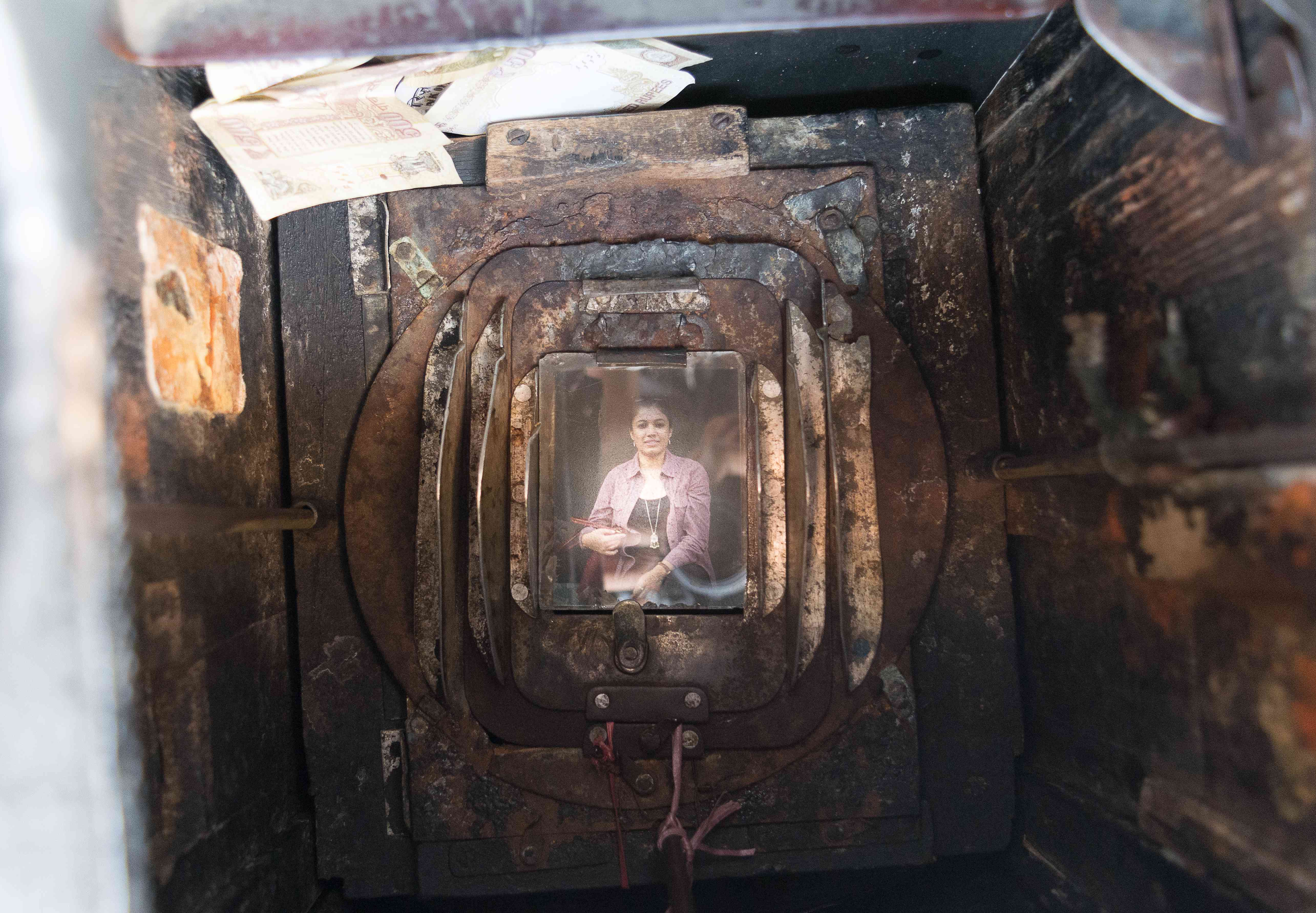 He keeps the money earned inside the camera only