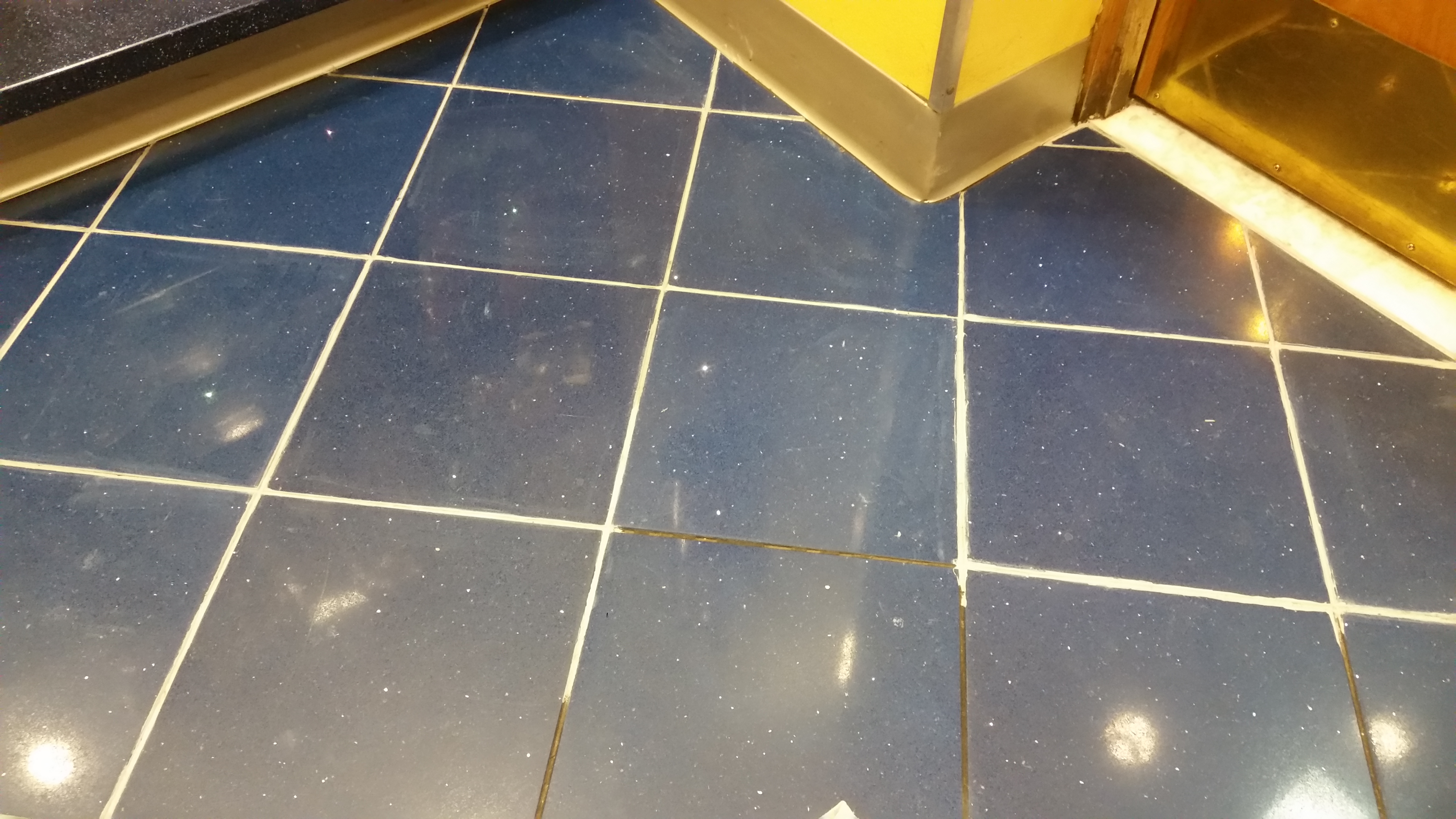 Beginning Installation of Grout Renew Colorant in Delorean Gray