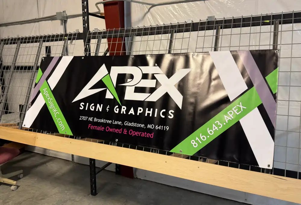 APEX Sign & Graphics custom banner with bold graphics and high visibility design