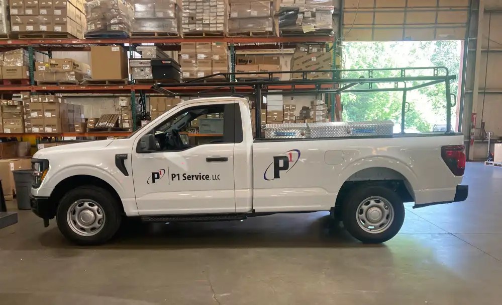 P1 Service digital vehicle graphics with vibrant branding installed on commercial fleet vehicle