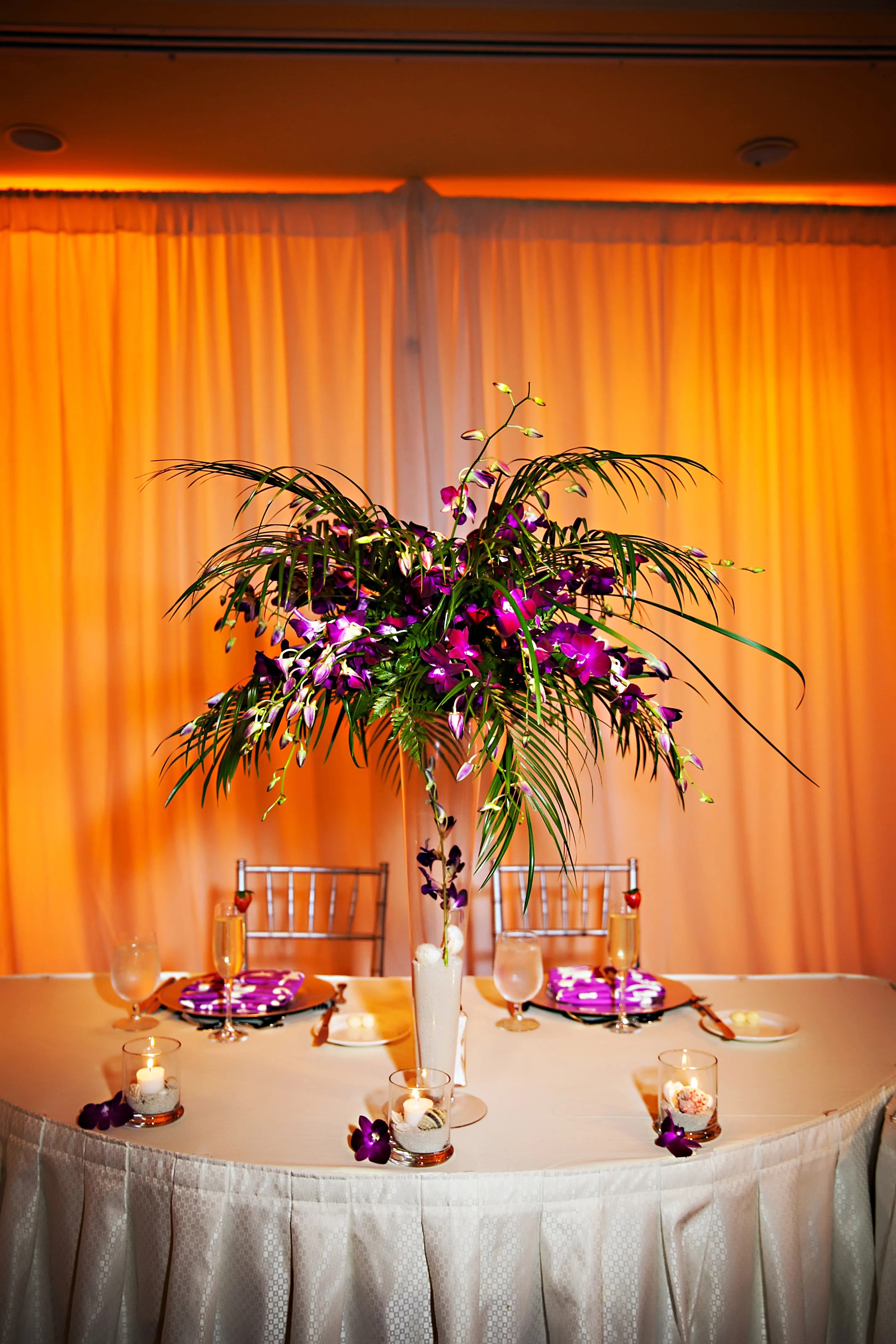 Four seasons resort palm beach offers an unforgettable wedding experience featuring gorgeous venues, exclusive packages, professional planning & more. Tropical Purple and Palm Tree Leaf Centerpiece