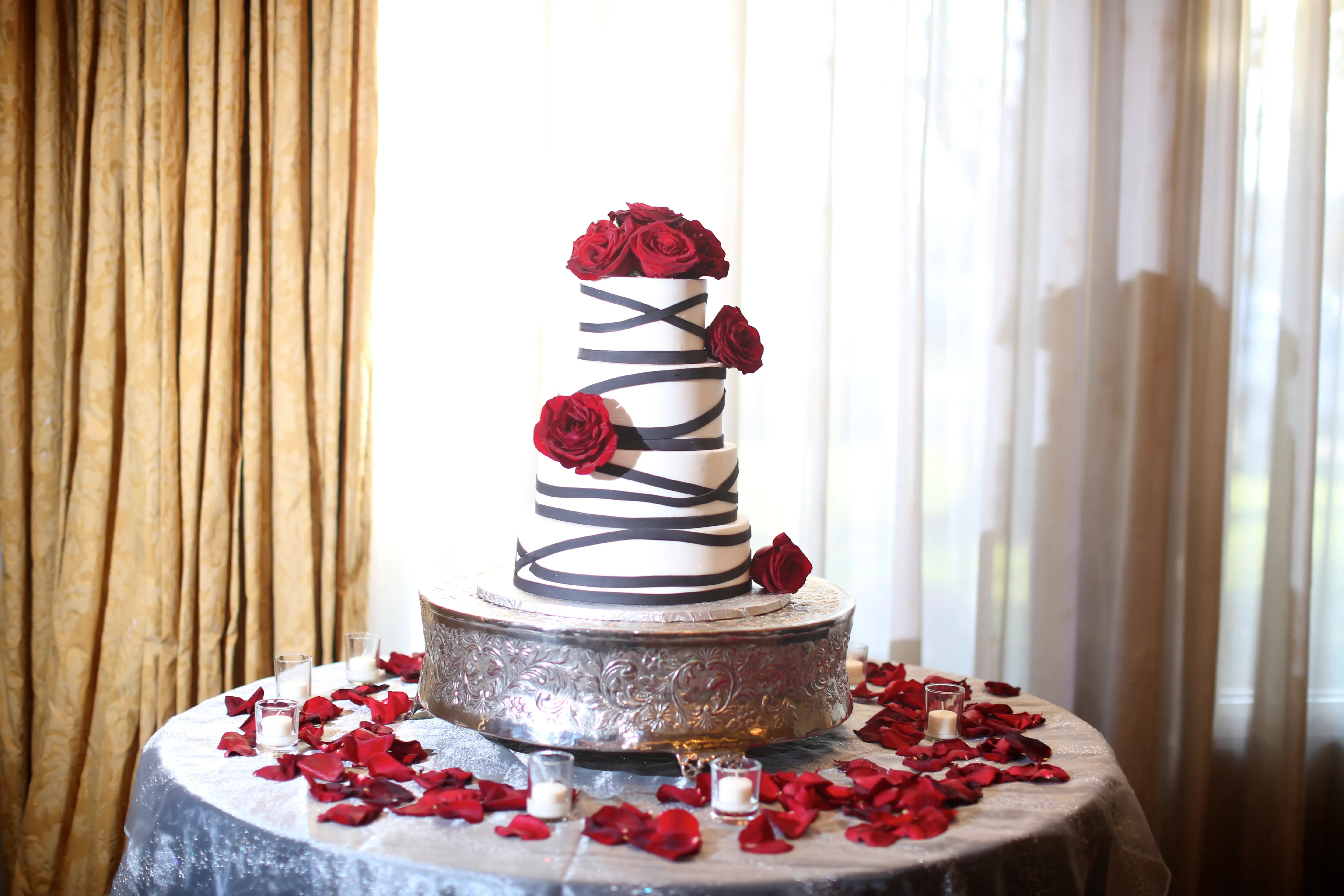 Red and dark pink flowers, . Black And White Wedding Cake With Red Roses