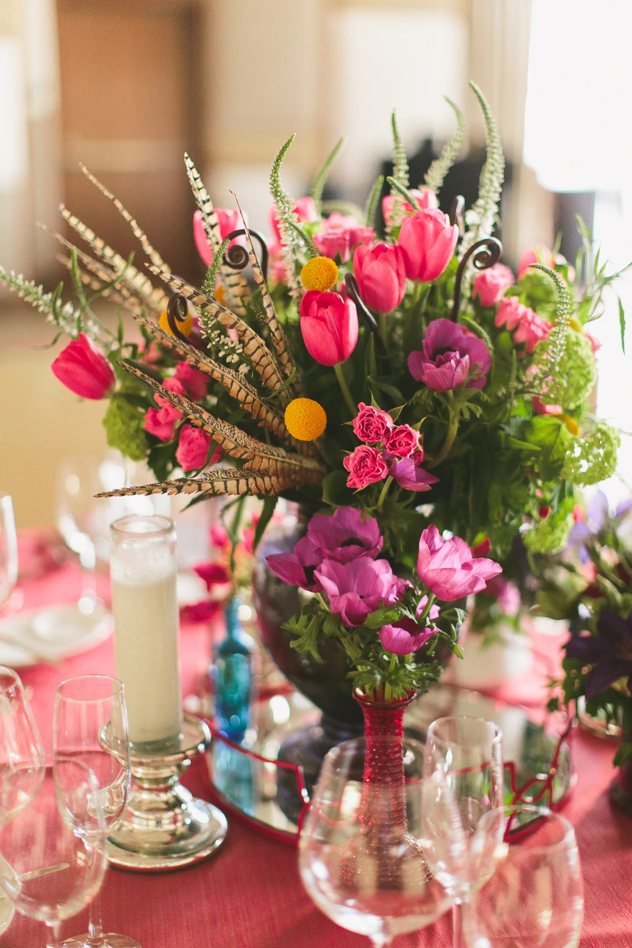 Not everyone can afford a royal wedding. Bright Pink Flower Centerpiece With Greenery