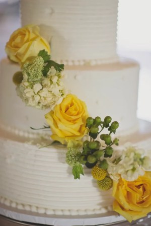 yellow cake decorated rose hypericum berry roses buttercream weddings tier