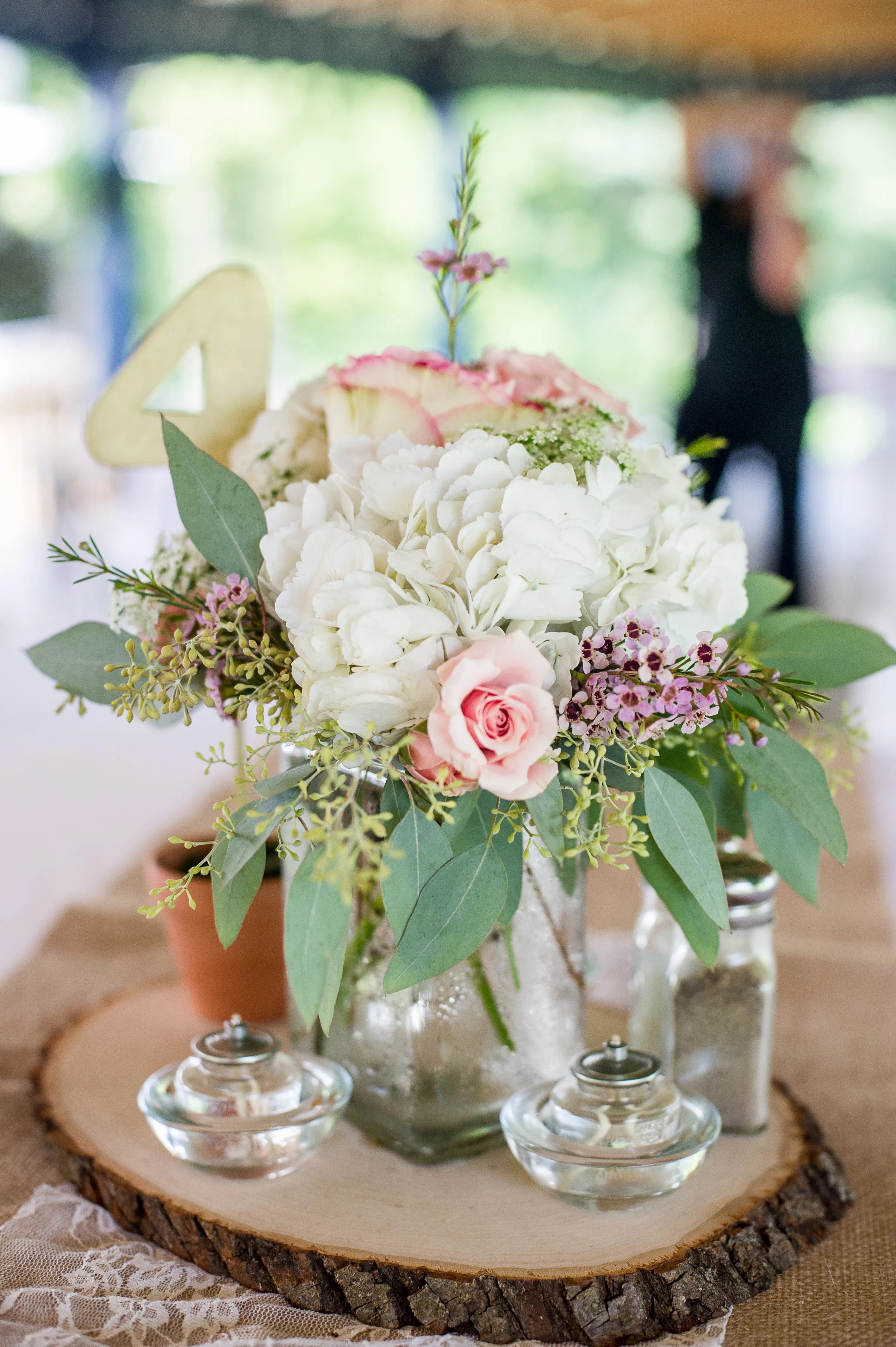 Reception with cocktails and canapés (this can be held outside, weather . Rose, Hydrangea, Purple Wax and Eucalyptus Centerpieces