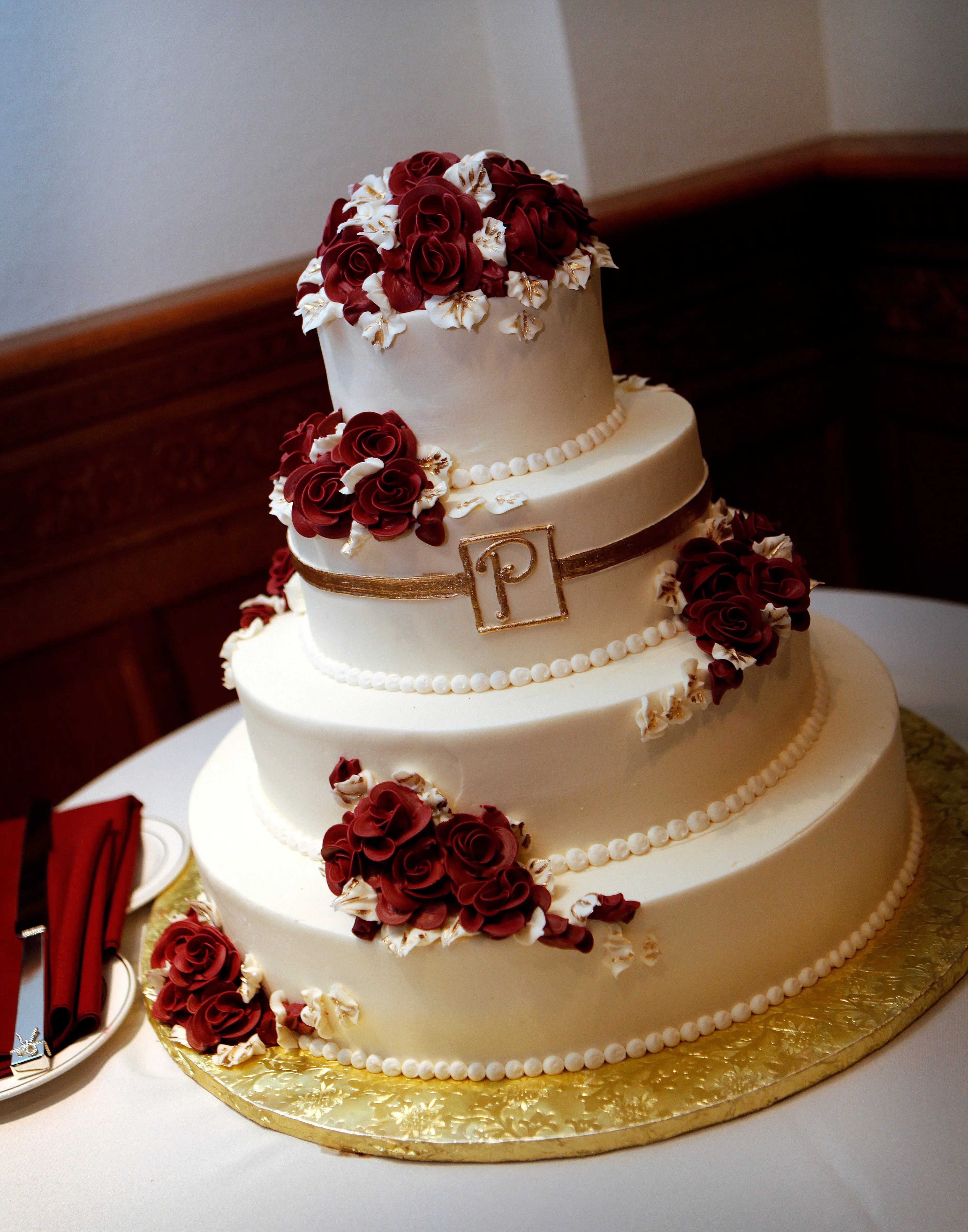 This party is definitely a family affair! Red And Gold Wedding Cake