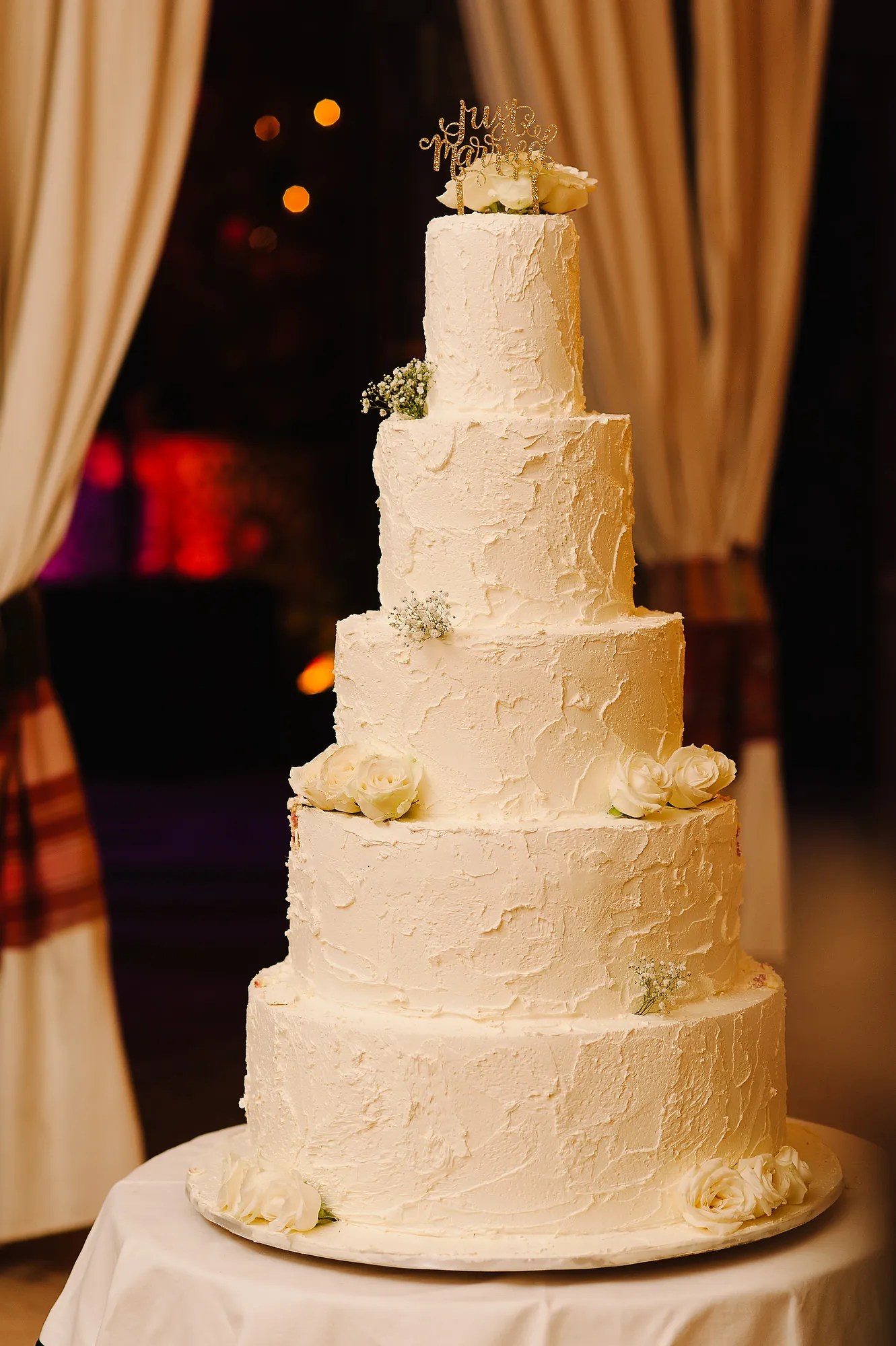 Toronto wedding planners and event designers specializing in luxury weddings, corporate and private events with seamless day of coordination. Five-Tier Wedding Cake