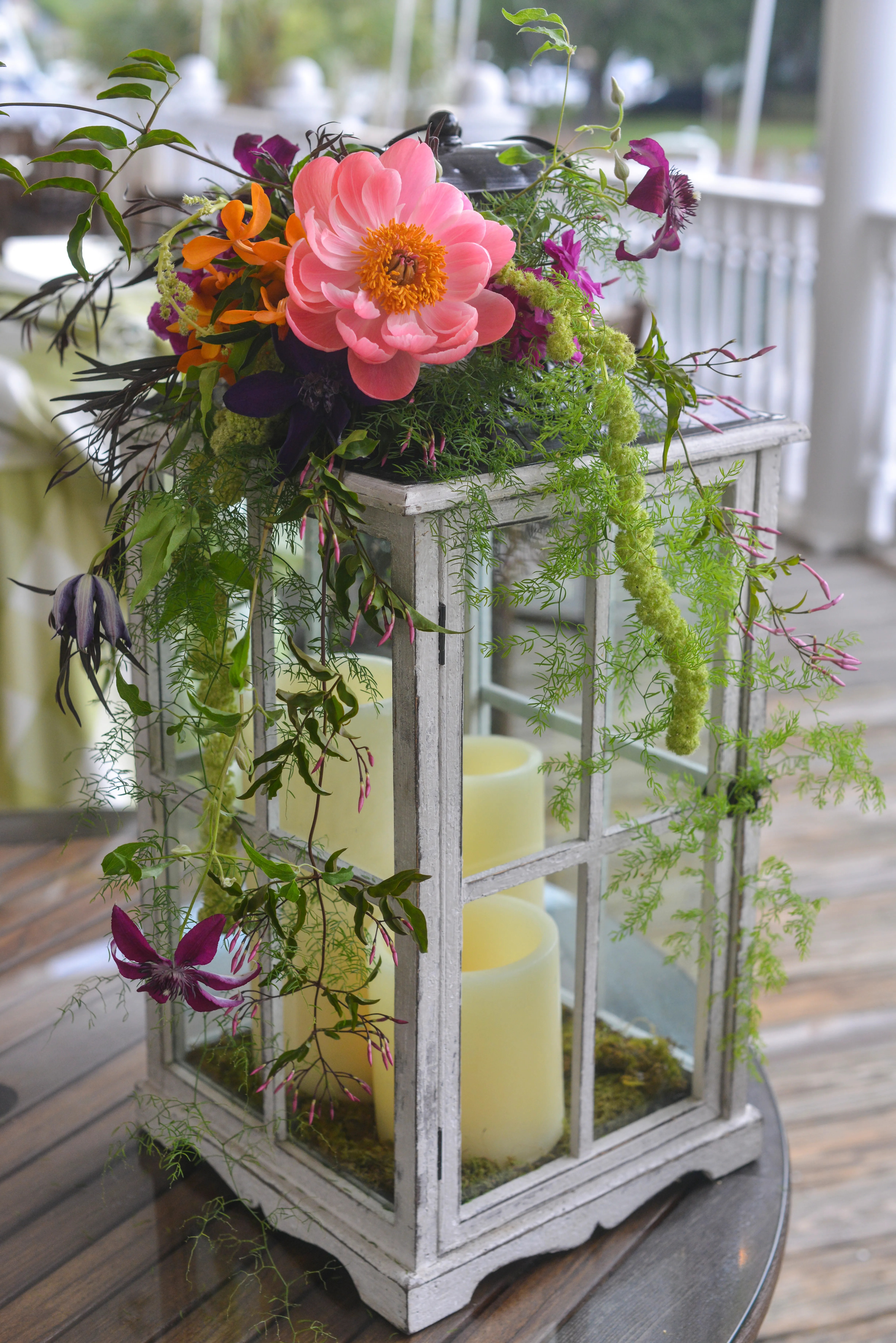 Here you can find unique wedding gifts for the happy couple. Lantern Centerpiece With Fresh-Flower Accents