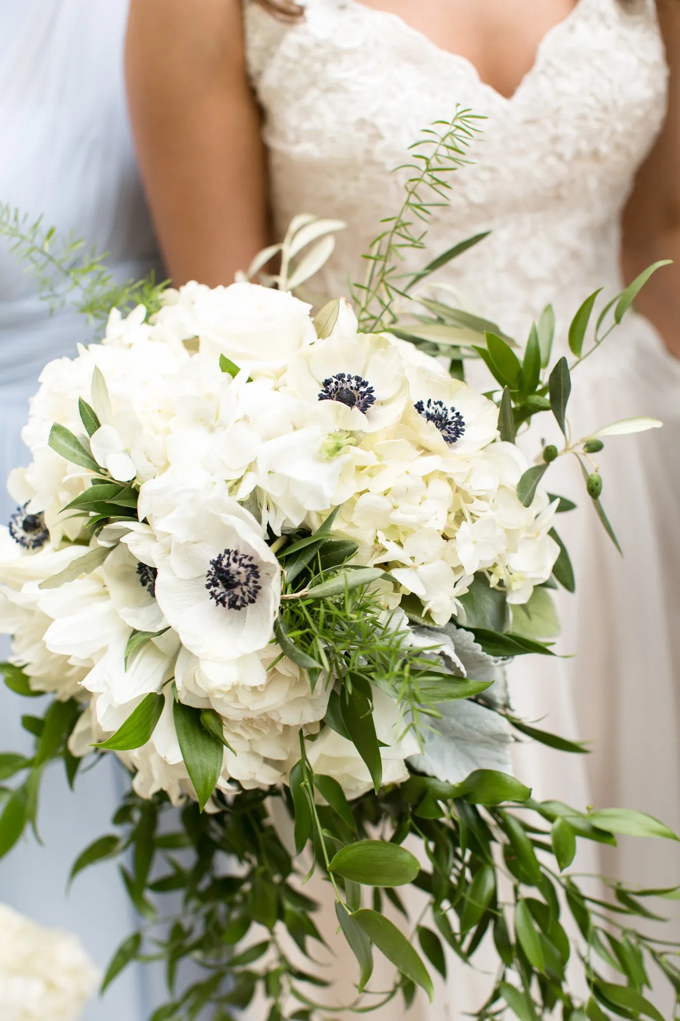 If you want to suffuse your wedding flowers with symbolism, check out our guide to the most popular wedding flowers and decide which messages move you most—your florist can also be a great resource too. White Hydrangea and Anemone Bridal Bouquet