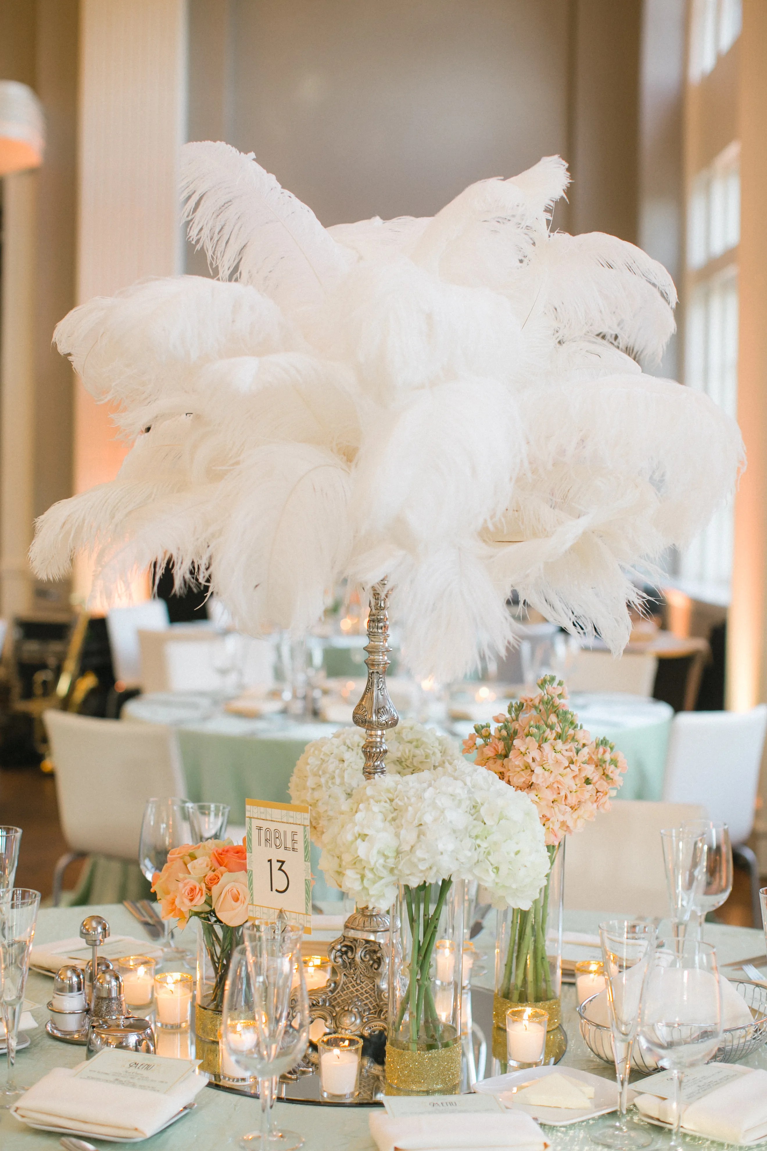 You should never assume you're invited to someone else's wedding. Gatsby Glam Feather Centerpieces