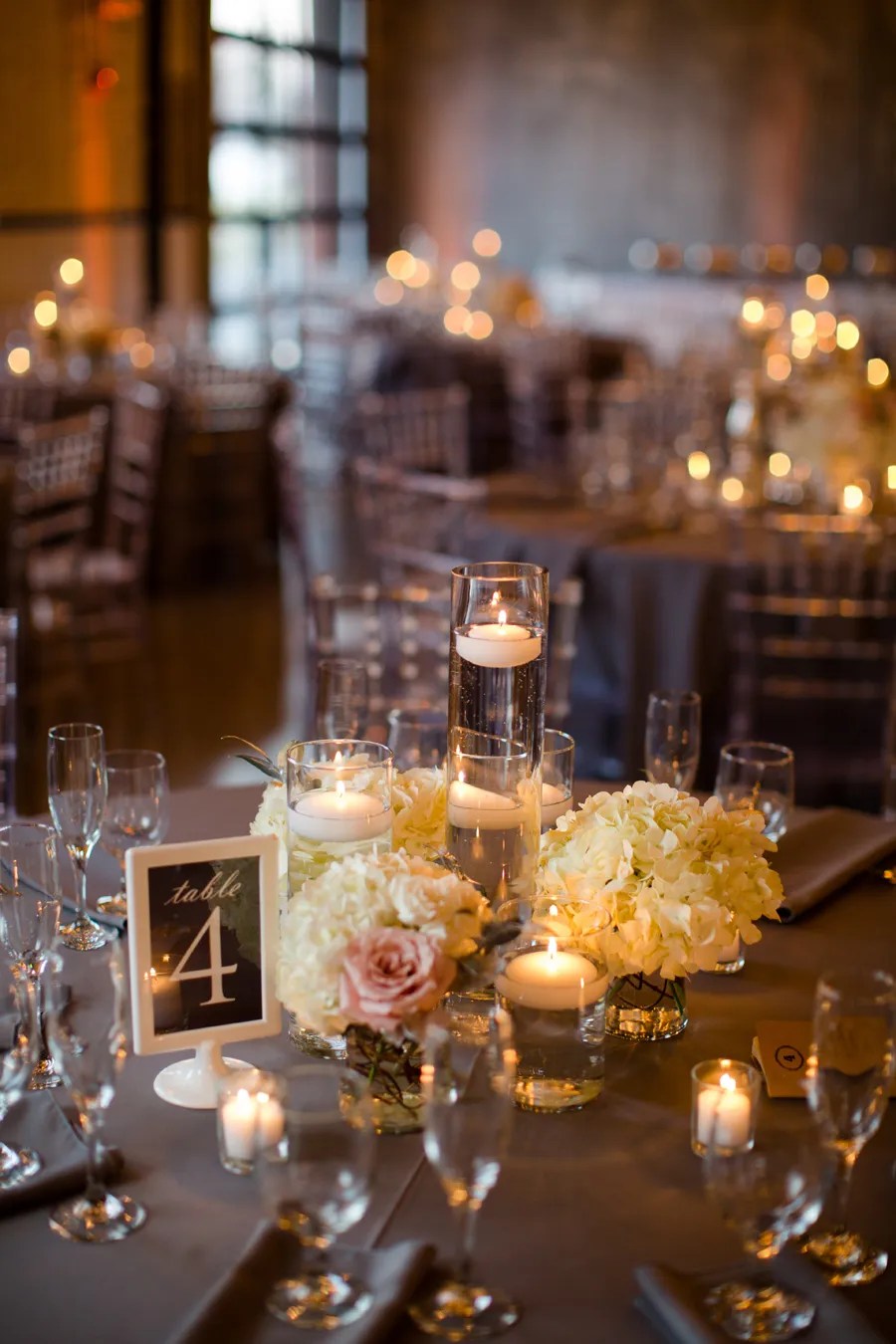 Learn more · 4u ranch rustic countryside barn wedding & event venue. Romantic Floating Candle and Hydrangea Centerpieces