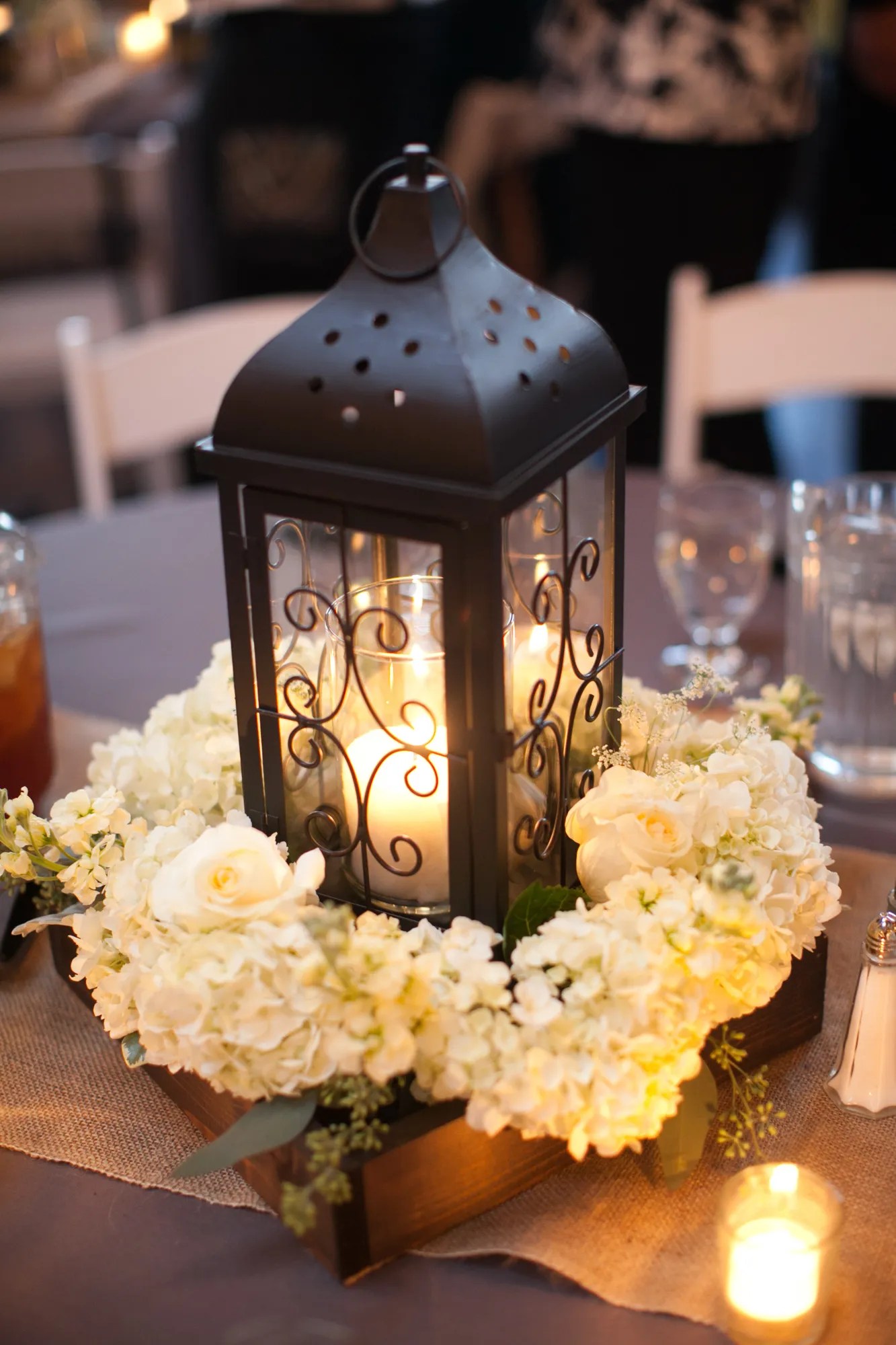 Most of their collections come in a few different color combos and offer matching save the dates, invites, thank you cards, programs and more. Black Lantern and White Hydrangea Centerpiece