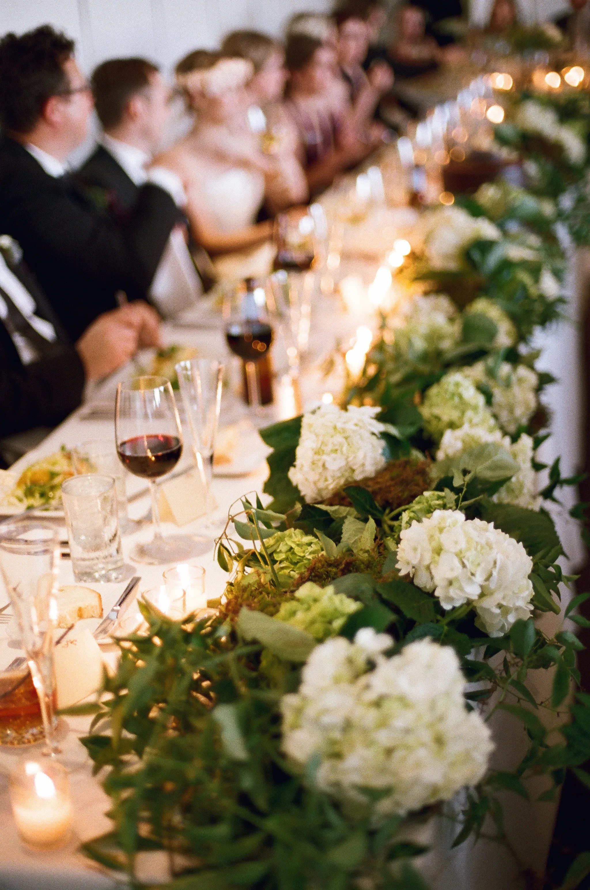 When it comes to addressing wedding invitations, traditional etiquette rules don't always apply. Rustic Hydrangea and Moss Wedding Table Garland