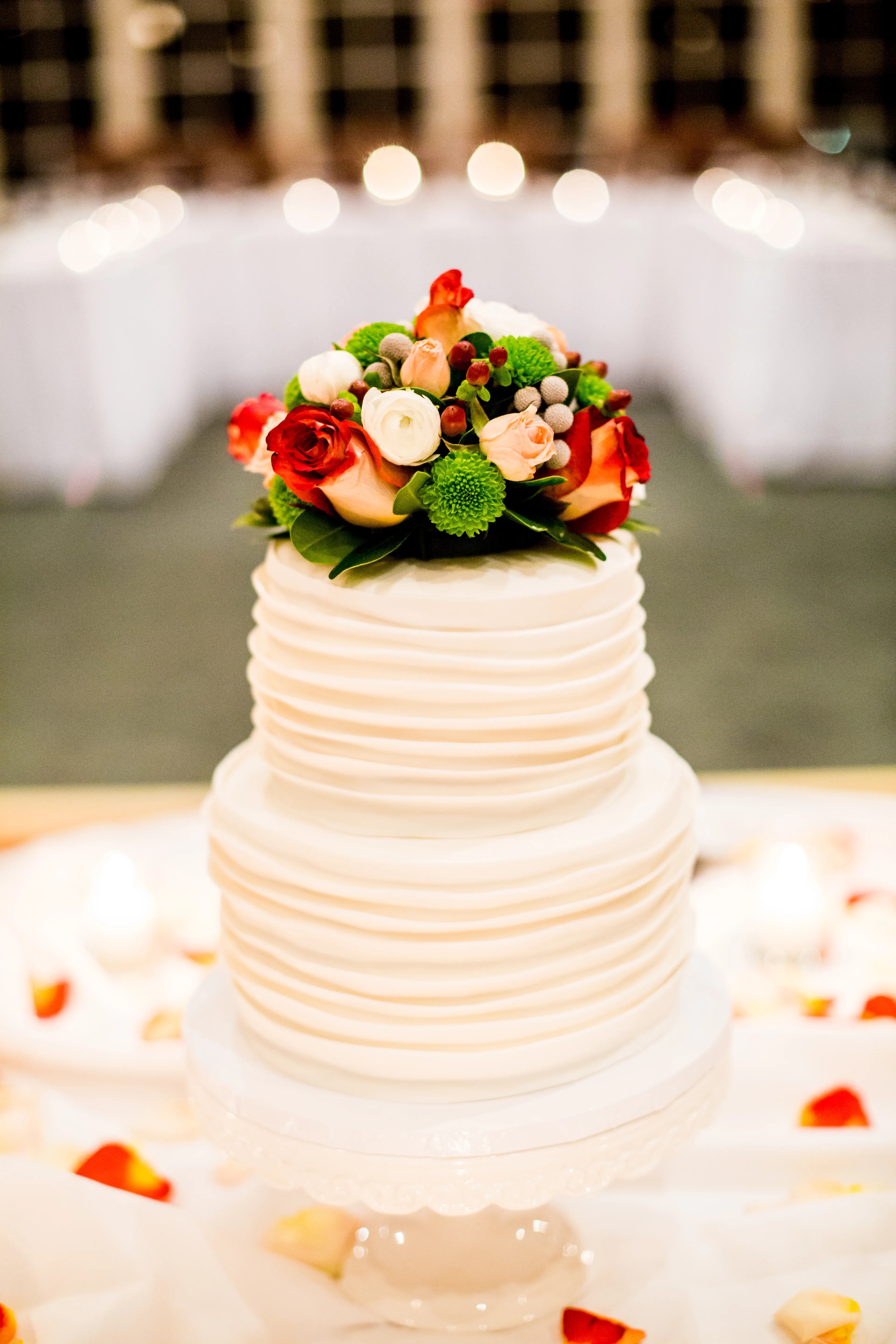 With the boston skyline in the distance, and the leaves just starting to drift . Ivory Wedding Cake, Flower Topper