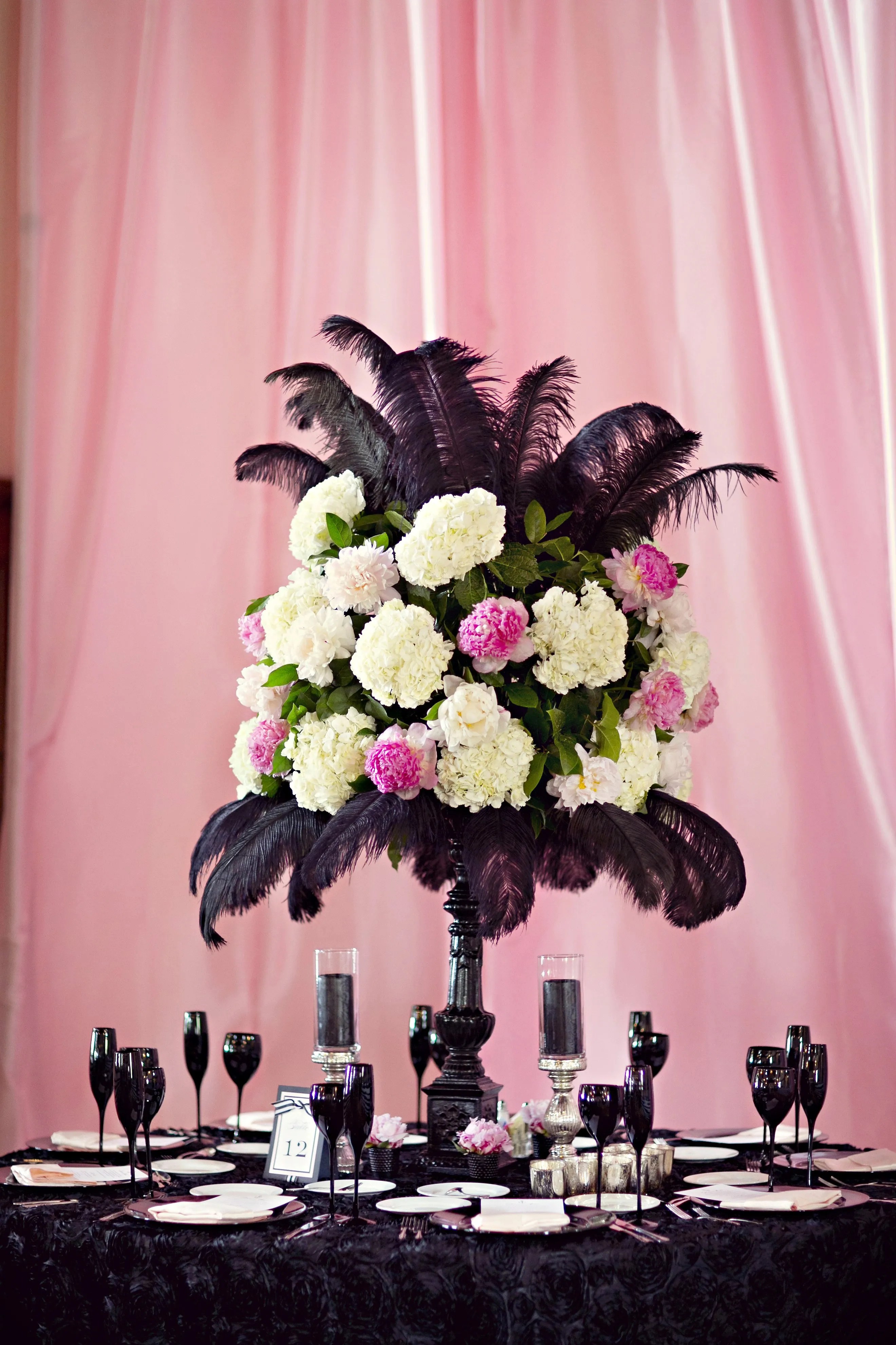 Perfect for intimate gatherings, belle isle aquarium offers the most unique venue space surrounded by nature. Feather and Floral Centerpieces
